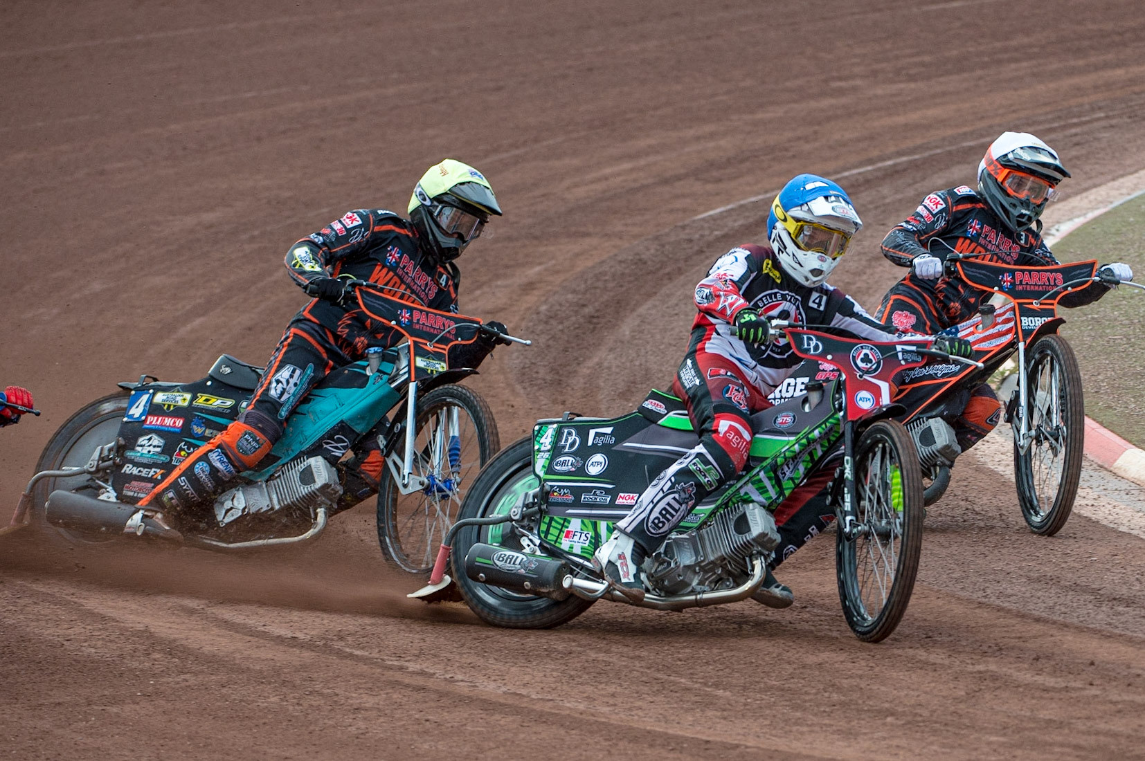 MANCHESTER, UK. JUN 13TH Charles Wright  (Blue) leads Luke Becker  (White) and Ryan Douglas  (Yellow) during the SGB Premiership match between Belle Vue Aces and Wolverhampton  Wolves at the National Speedway Stadium, Manchester on Monday 13th June 2022. (Credit: Ian Charles | MI News)