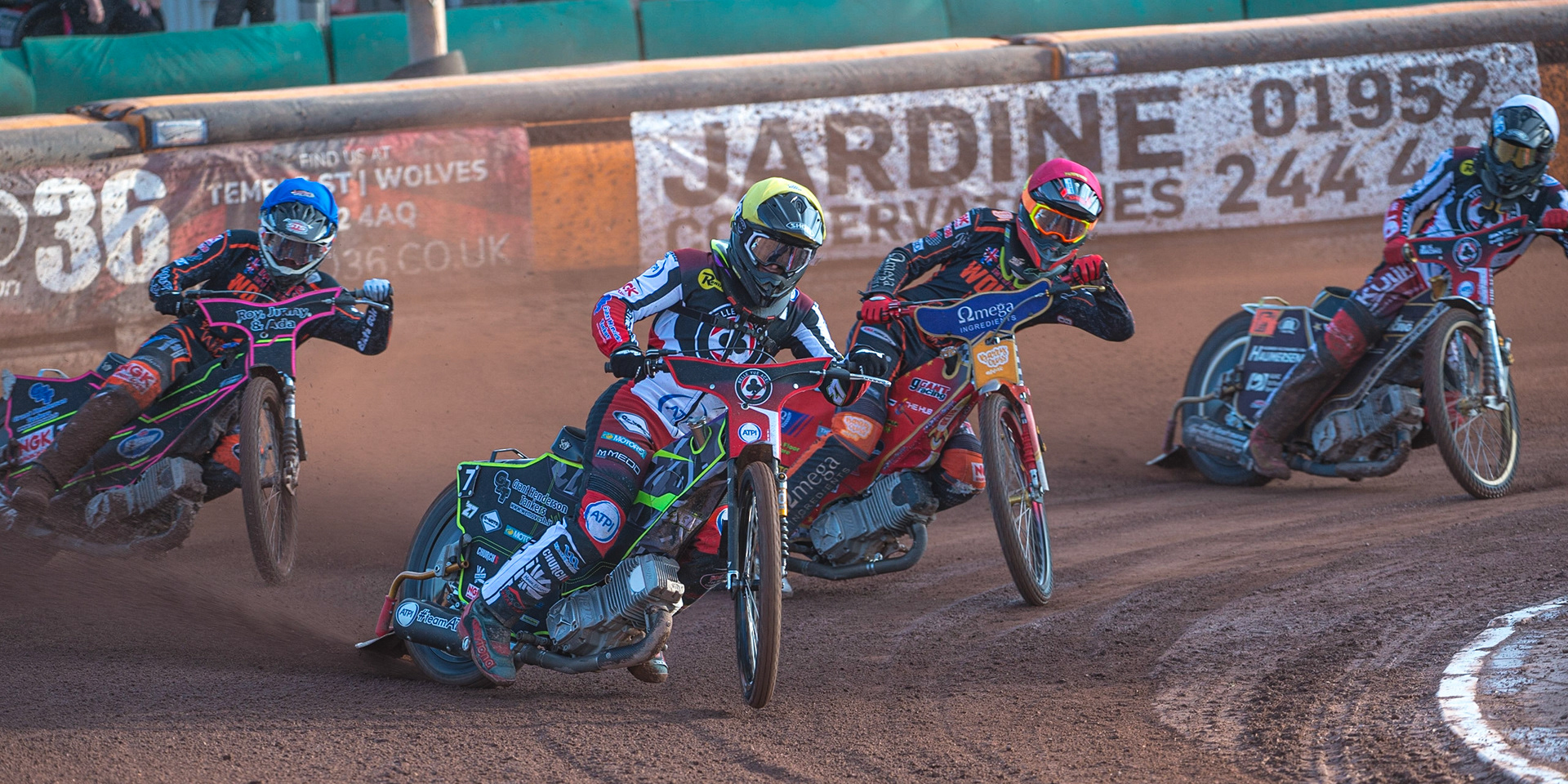 WOLVERHAMPTON, UK. JUN 20TH Tom Brennan  (Yellow) leads Drew Kemp  (Red) Leon Flint  (Blue) and Norick Blödorn  (White) during the SGB Premiership match between Wolverhampton Wolves and Belle Vue Aces at Monmore Green Stadium, Wolverhampton on Monday 20th June 2022. (Credit: Ian Charles | MI News)