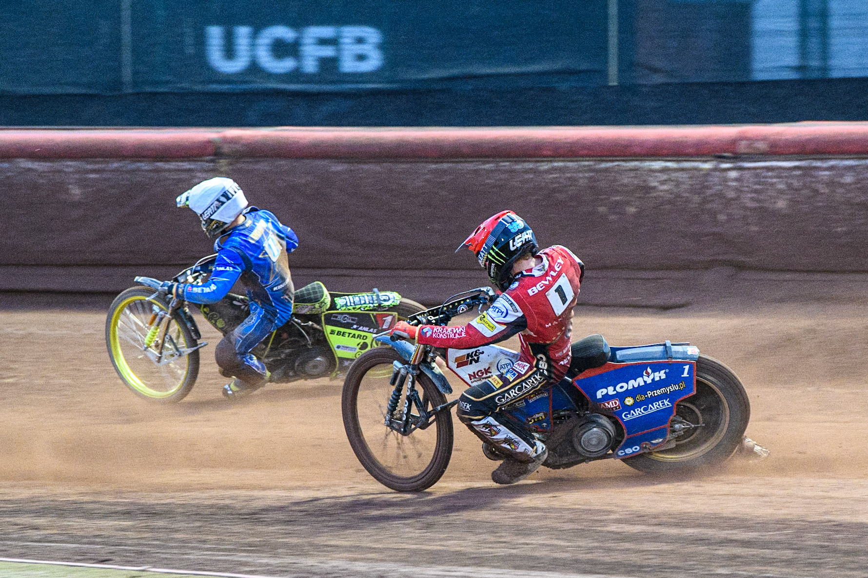 Dan Bewley (Red) chases Artem Laguta (White) during the Sports Insure Premiership match between Belle Vue Aces and King's Lynn Stars at the National Speedway Stadium, Manchester on Monday 12th June 2023. (Photo: Ian Charles | MI News)