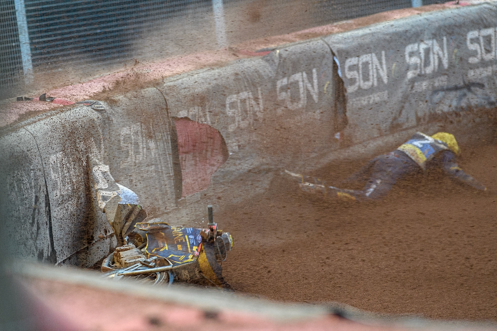 Marko Levishyn of Ukraine in Yellow crashes out of his final heat during the Monster Energy FIM Speedway of Nations Semi-Final 1 at the National Speedway Stadium, Manchester on Tuesday 9th July 2024. (Photo: Ian Charles | MI News)
