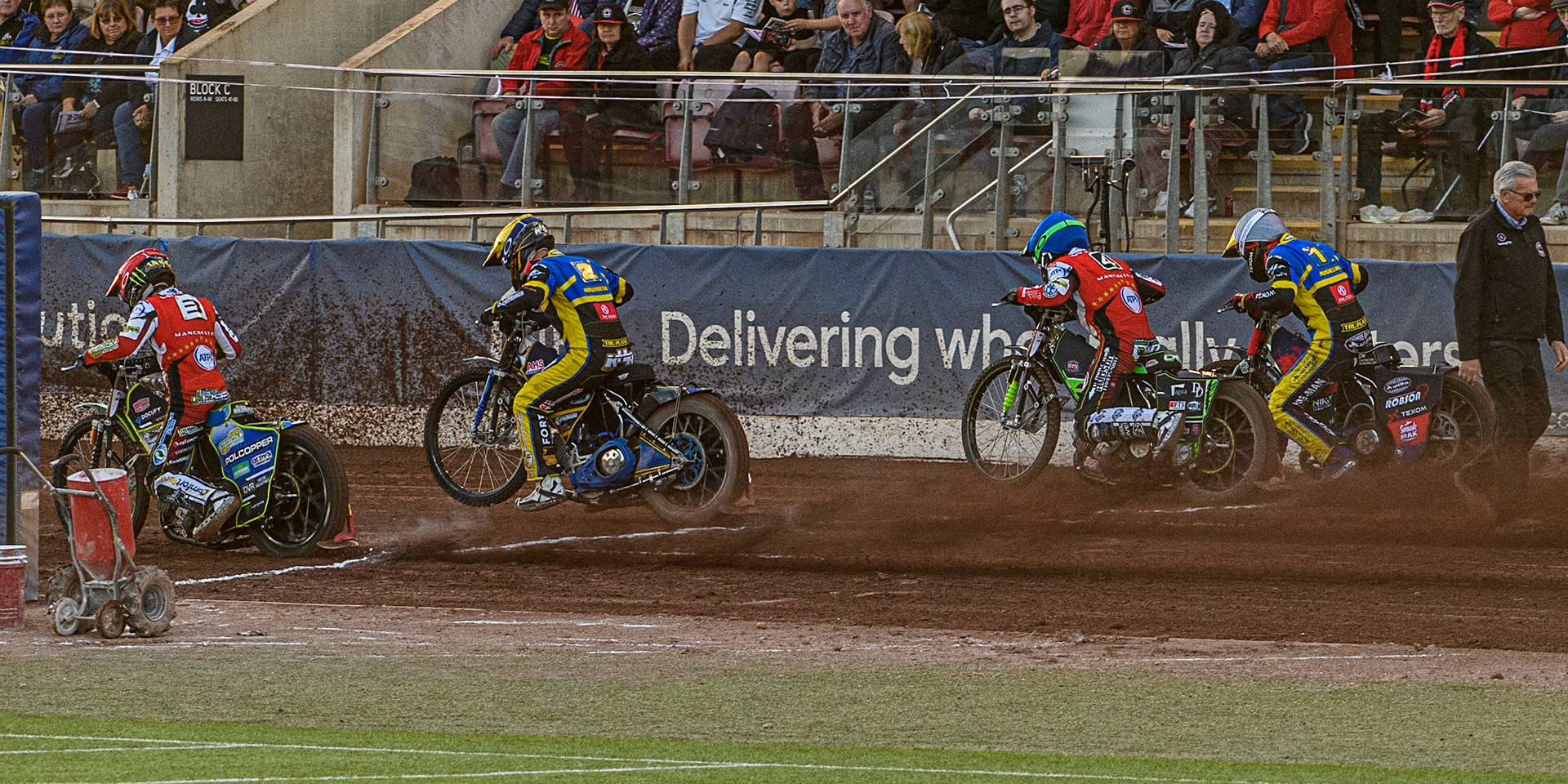 (l - r) Jaimon Lidsey (Red), Kyle Howarth (Yellow), Charles Wright (Blue) and Tobiasz Musielak (White) leave the start in Heat 5 during the Sports Insure Premiership match between Belle Vue Aces and Sheffield Tigers at the National Speedway Stadium, Manchester on Monday 7th August 2023. (Photo: Ian Charles | MI News)