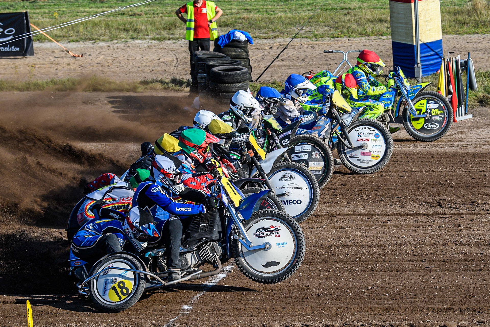 Sidecar Final: (L to R) Kenny Van Eeckhout &amp; Axelle Cannaerts (18) of Belgium in Black &amp; White, Clement &amp; Romain Furet (32) of France in Green ,\  Mike Frederiksen &amp; Jette Maersk (6) of Denmark in Yellow, Josh &amp; Scott Goodwin (3) of Great Britain  in White, Wilfred Detz &amp; Britget Portijk (1) of The Netherlands  in Blue and Mitch Goddard &amp; Paul Smith (9) of Great Britain in Red in the Sidecar Support Class during the FIM Long Track World Championship Final 5 at the Speed Centre Roden, Roden, Netherlands on Sunday 22nd September 2024. (Photo: Ian Charles | MI News)