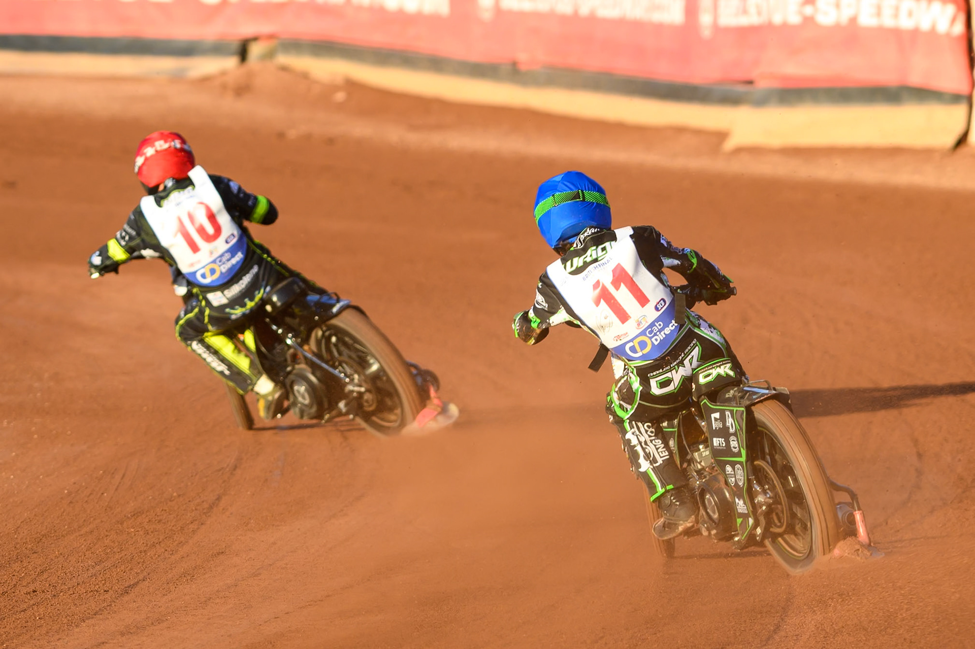Charles Wright (11) in Blue chases Danny King (10) in Red during the Cab Direct British Speedway Championship Final at the National Speedway Stadium, Manchester on Saturday 15th August 2026. (Photo: Ian Charles | MI News)