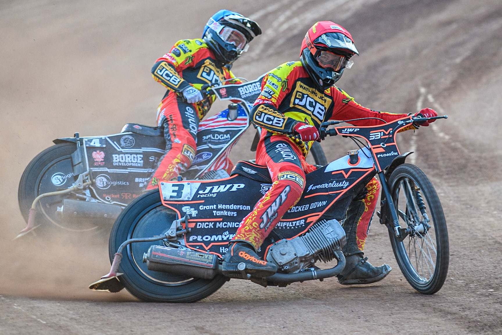 Leicester Lions' Sam Masters in Red leading team mate Luke Becker during the Rowe Motor Oil Premiership match between Leicester Lions and Belle Vue Aces at the Pidcock Motorcycles Arena, Leicester on Thursday 25th July 2024. (Photo: Ian Charles | MI News)
