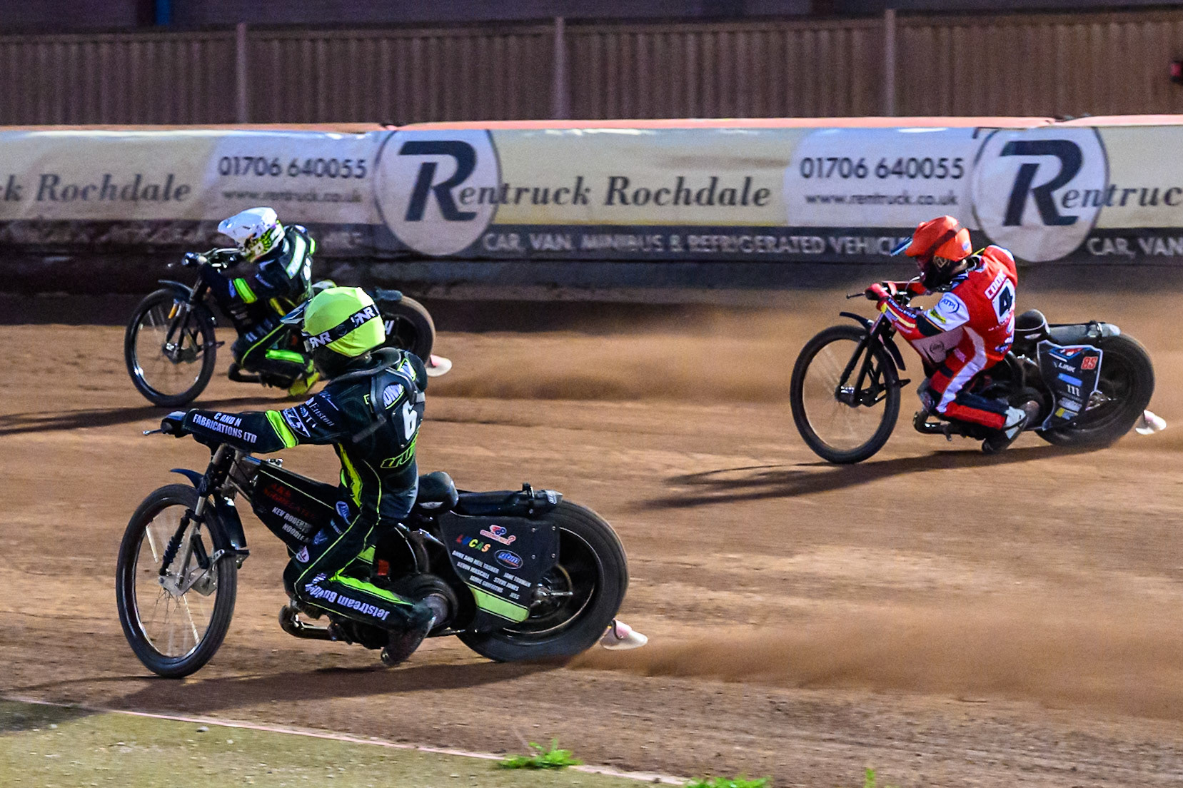Dan Thompson of Ipswich Witches  in Yellow rides inside Zach Cook of Belle Vue Aces  in Red and Tom Brennan of Ipswich Witches  in White during the Rowe Motor Oil Premiership match between Belle Vue Aces and Ipswich Witches at the National Speedway Stadium, Manchester on Monday 4th August 2025. (Photo: Ian Charles | MI News)