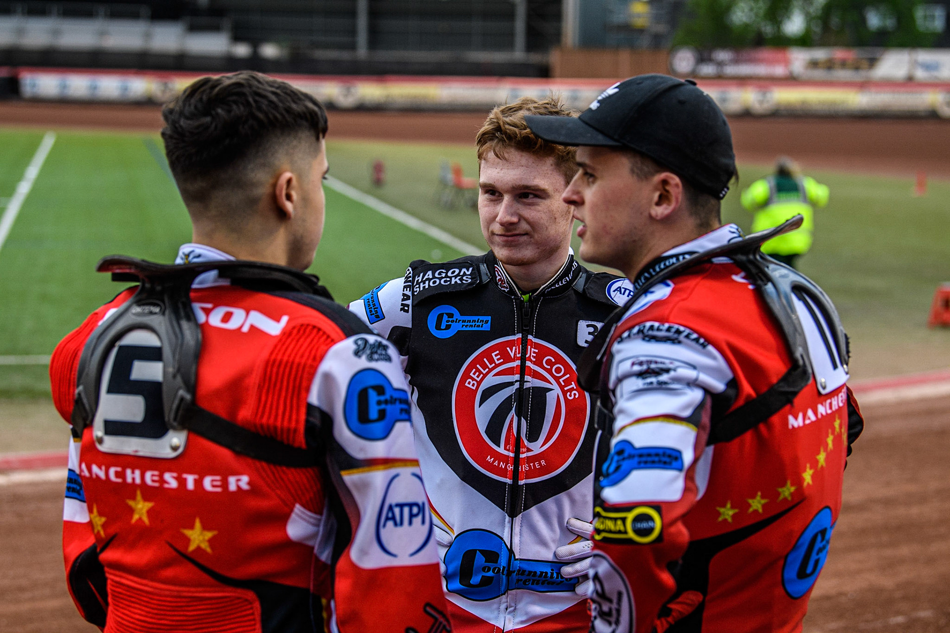 (l - r) James Pearson  Sam Hagon  and Jack Smith  chat during the National Development League match between Belle Vue Aces and Oxford Chargers at the National Speedway Stadium, Manchester on Friday 12th May 2023. (Photo: Ian Charles | MI News)
