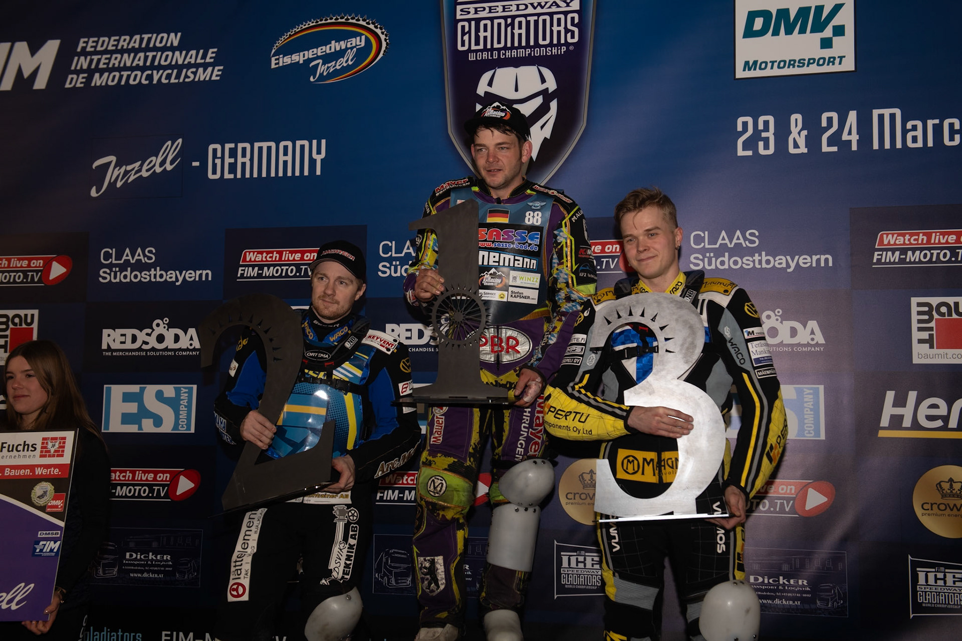 Top 3: (L to R) Sweden's Martin Haarahiltunen (2nd) Germany's Max Niedermaier (1st), Finland's Heikki Huusko (3rd) during the FIM Ice Speedway Gladiators World Championship Final 1 at the Max-Aicher-Arena, Inzell on Saturday 23 March 2024. (Photo: Ian Charles | MI News)
