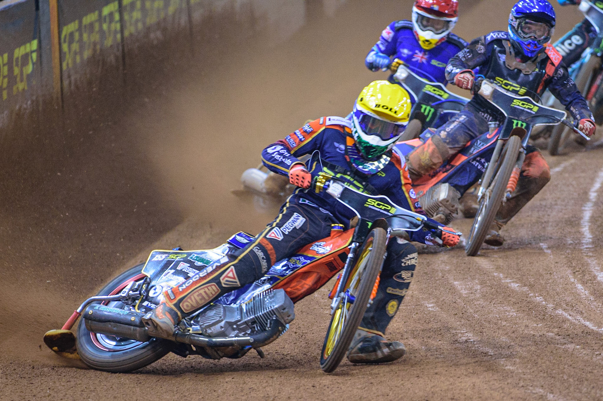 Mikkel Michelsen (155) (Yellow) leads Andžejs Ļebedevs (29) (Blue) and Robert Lambert (505) (Red) during the FIM  Speedway Grand Prix of Great Britain at the Principality Stadium, Cardiff on Saturday 13th August 2022. (Credit: Ian Charles | MI News
