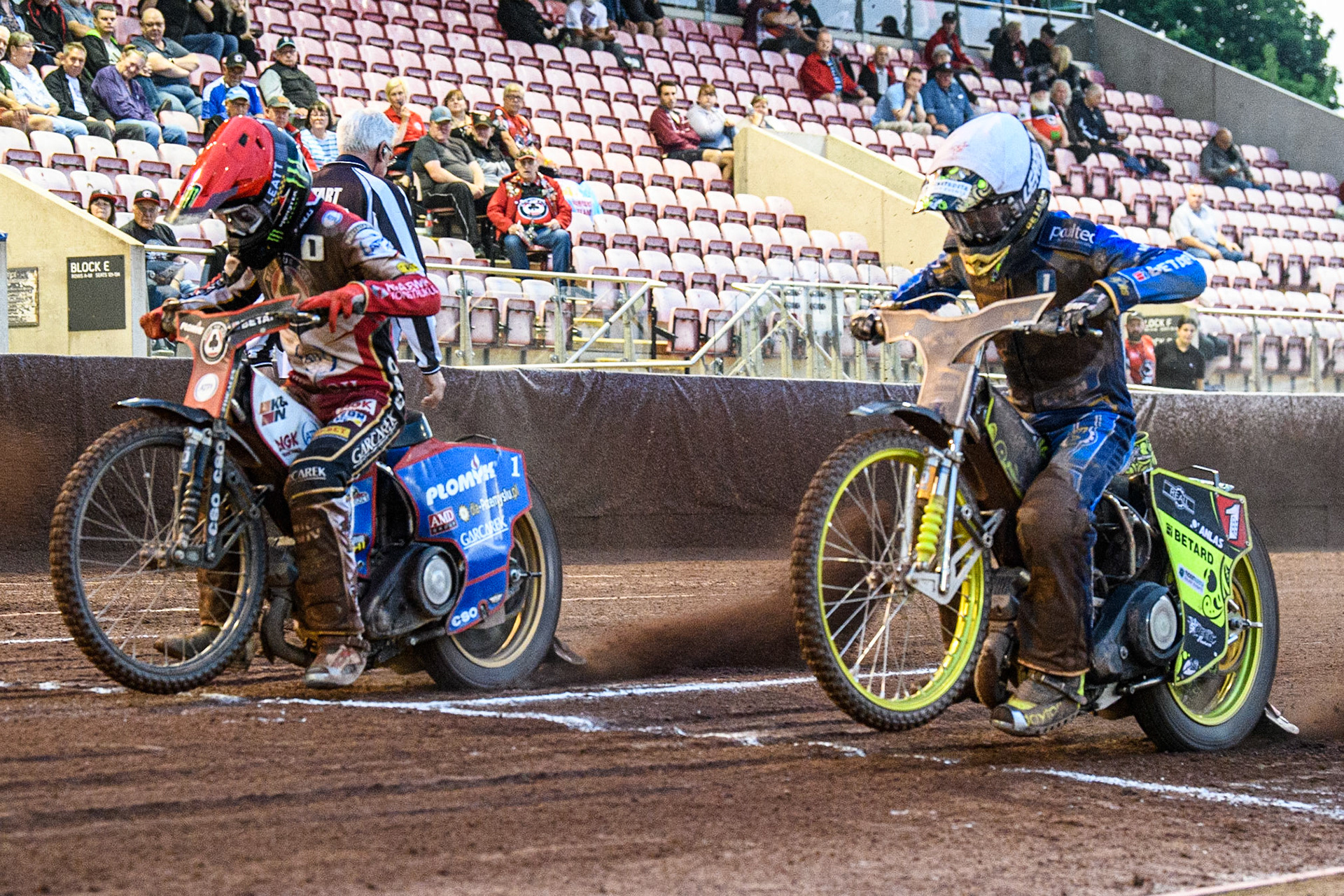 Dan Bewley (Red) (left) and Artem Laguta (White) leave the start during the Sports Insure Premiership match between Belle Vue Aces and King's Lynn Stars at the National Speedway Stadium, Manchester on Monday 12th June 2023. (Photo: Ian Charles | MI News)