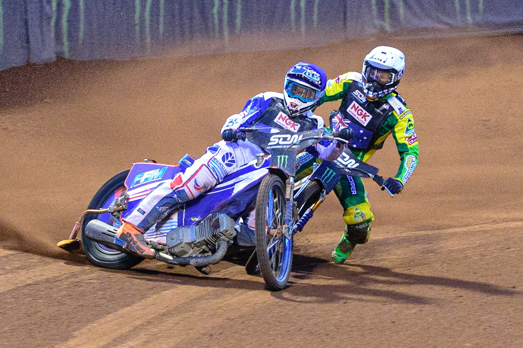 MANCHESTER, UK. OCT 16TH Jason Doyle of Australia (White) locks up behind Dmitri Berge of France (Blue) during the Monster Energy FIM Speedway of Nations at the National Speedway Stadium, Manchester on Saturday  16th October 2021. (Credit: Ian Charles | MI News)