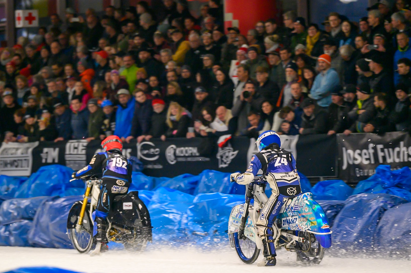 Max Koivula (24) of Finland  in Blue chases Niclas Svensson (192) of Sweden  in Red during the Ice Speedway Gladiators World Championship Final 1 at Max-Aicher-Arena, Inzell on Saturday 14th March 2026. (Photo: Ian Charles | MI News)