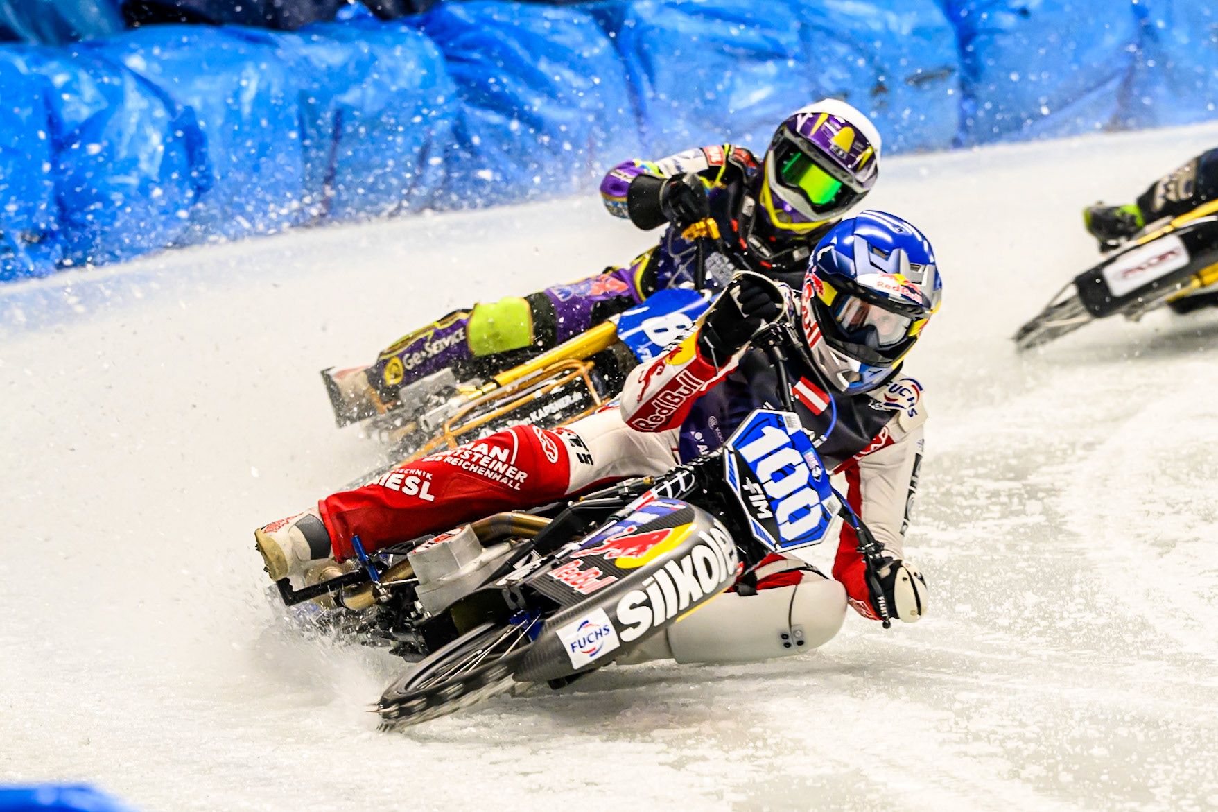 Franz Zorn (100) of Austria  in Blue leading Max Niedermaier (88) of Germany  in White during the Ice Speedway Gladiators World Championship Final 1 at Max-Aicher-Arena, Inzell on Saturday 14th March 2026. (Photo: Ian Charles | MI News)