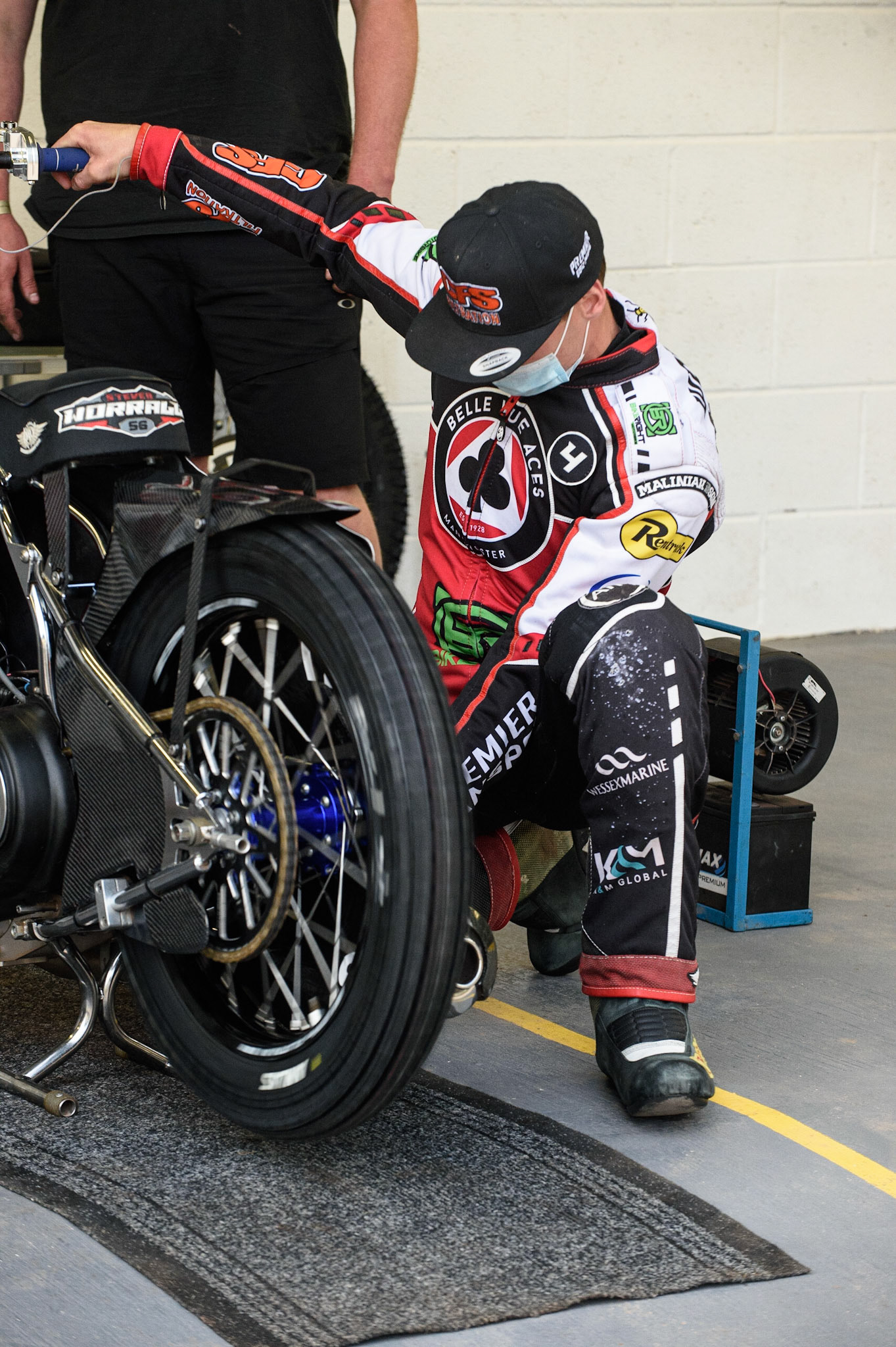 MANCHESTER, UK. JUNE 7TH   Belle Vue Bikeright Aces  rider Steve Worrall prepares his machine during the SGB Premiership match between Belle Vue Aces and Ipswich Witches at the National Speedway Stadium, Manchester on Monday 7th June 2021. (Credit: Ian Charles | MI News)
