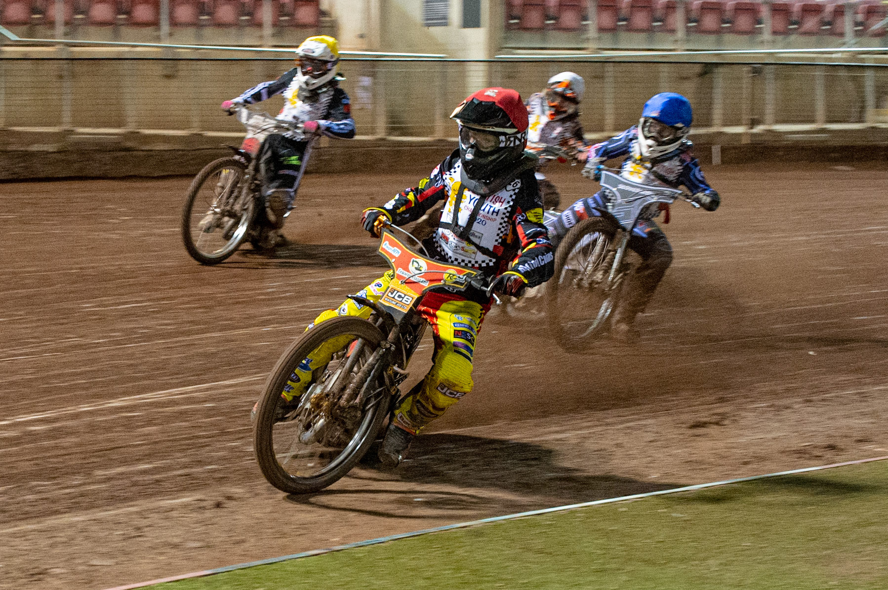 Photo: Ian CharlesDan Thompson (Red) leads Sam McGurk (Blue) Mickey Simpson (White) and Archie Freeman (Yellow) (500cc A Class)British Youth Speedway Championship (Round 5), National Speedway Stadium, Manchester Saturday  10  October  2020