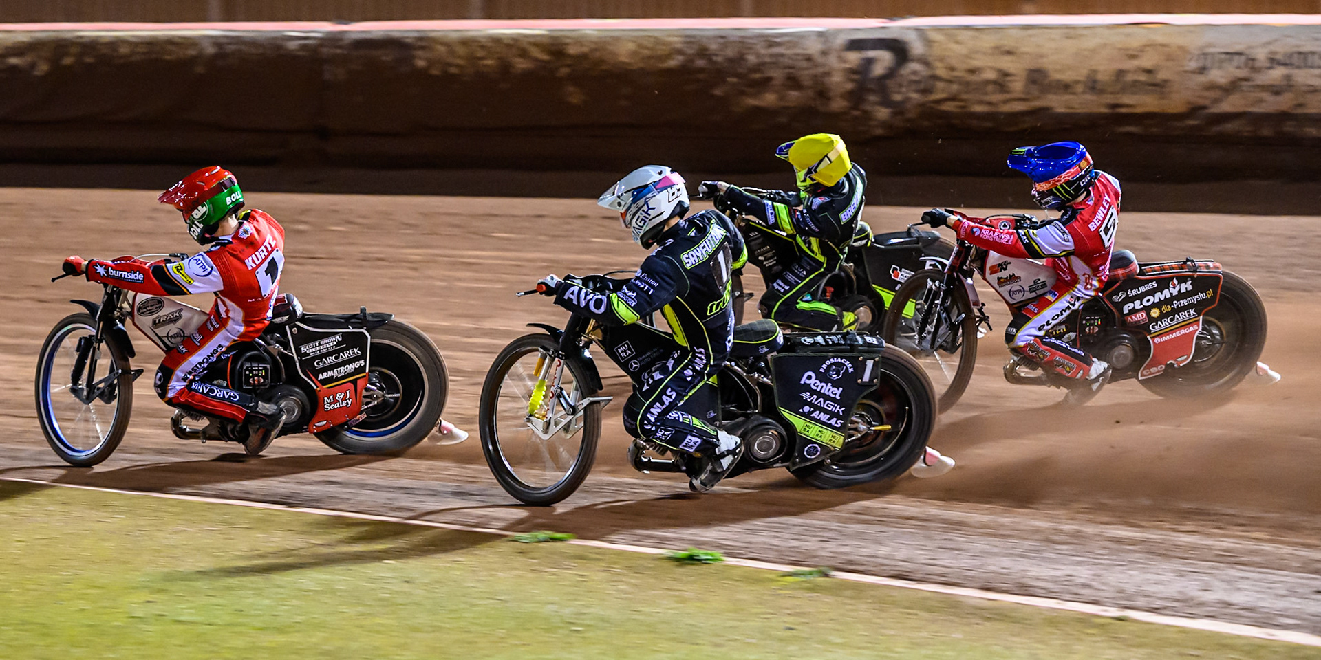 Brady Kurtz of Belle Vue Aces  in Red leading Tom Brennan of Ipswich Witches  in Yellow, Dan Bewley of Belle Vue Aces  in Blue and Emil Saifutdinov of Ipswich Witches  in White during the Rowe Motor Oil Premiership Play Off Semi Final 1 (1st Leg)  between Belle Vue Aces and Ipswich Witches at the National Speedway Stadium, Manchester on Monday 8th September 2025. (Photo: Ian Charles | MI News)