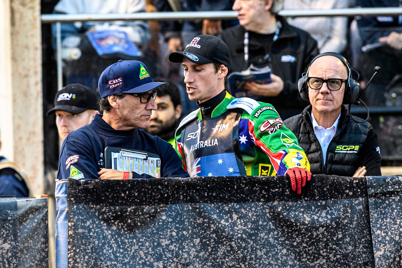 Max Fricke of Australia (Right) speaks to Australian Team manager, Mark Lemon during the Monster Energy FIM Speedway of Nation Final at the National Speedway Stadium, Manchester on Saturday 13th July 2024. (Photo: Ian Charles | MI News)