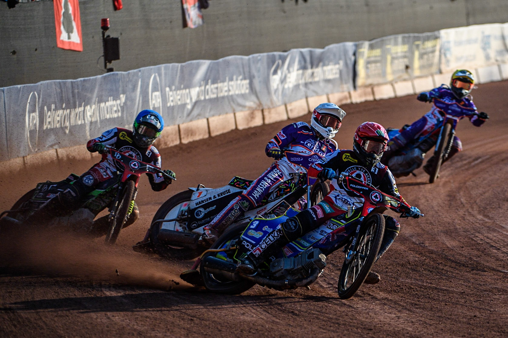 Jaimon Lidsey (Blue) leads Niels-Kristian Iversen  (White),  Charles Wright (Blue) and Ben Cook (Yellow) during the Sports Insure Premiership match between Belle Vue Aces and Peterborough at the National Speedway Stadium, Manchester on Monday 19th June 2023. (Photo: Ian Charles | MI News)
