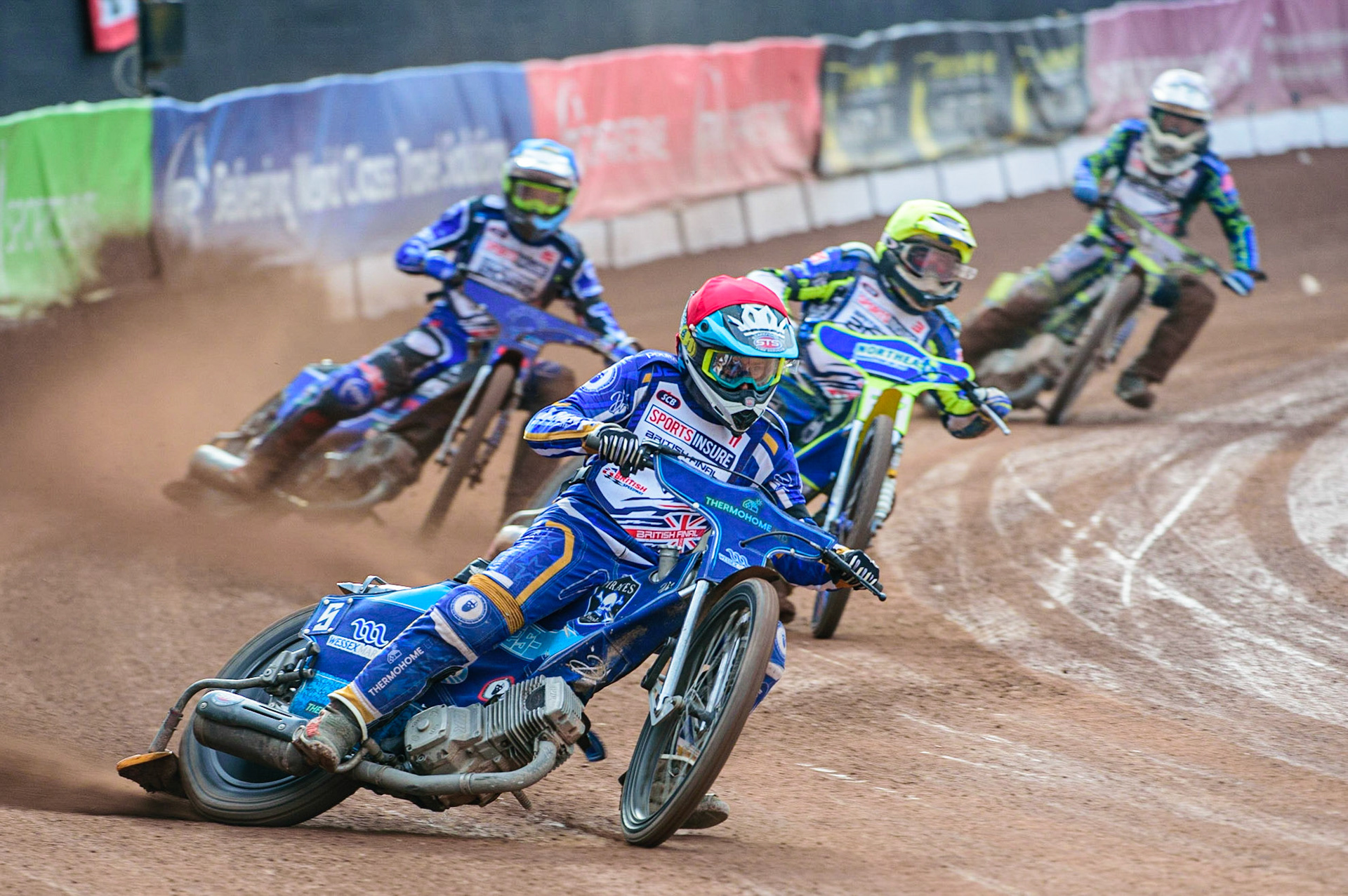Richard Lawson  (Red) leads Chris Harris  (Yellow) Adam Ellis  (Blue) and Paul Starke (White)  during the Sports Insure British Speedway Final, at the National Speedway Stadium, Manchester, on Sunday 18th September 2022. (Credit: Ian Charles | MI News )