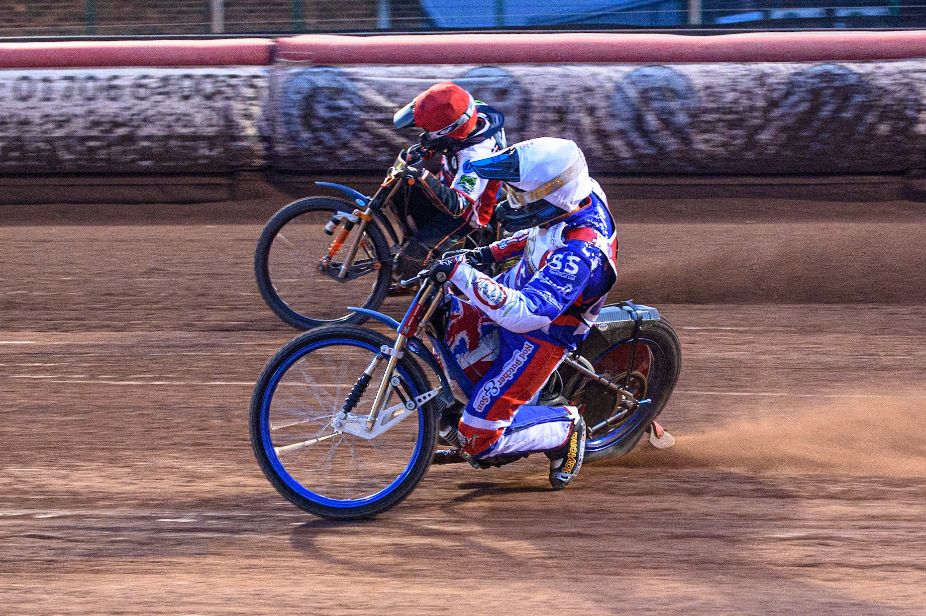 MANCHESTER, UK. JULY 23RD  Jack Smith (Red) passes Jake Knight  (White) on the outside during the National Development League match between Belle Vue Colts and Eastbourne Seagulls at the National Speedway Stadium, Manchester on Friday 23rd July 2021. (Credit: Ian Charles | MI News)