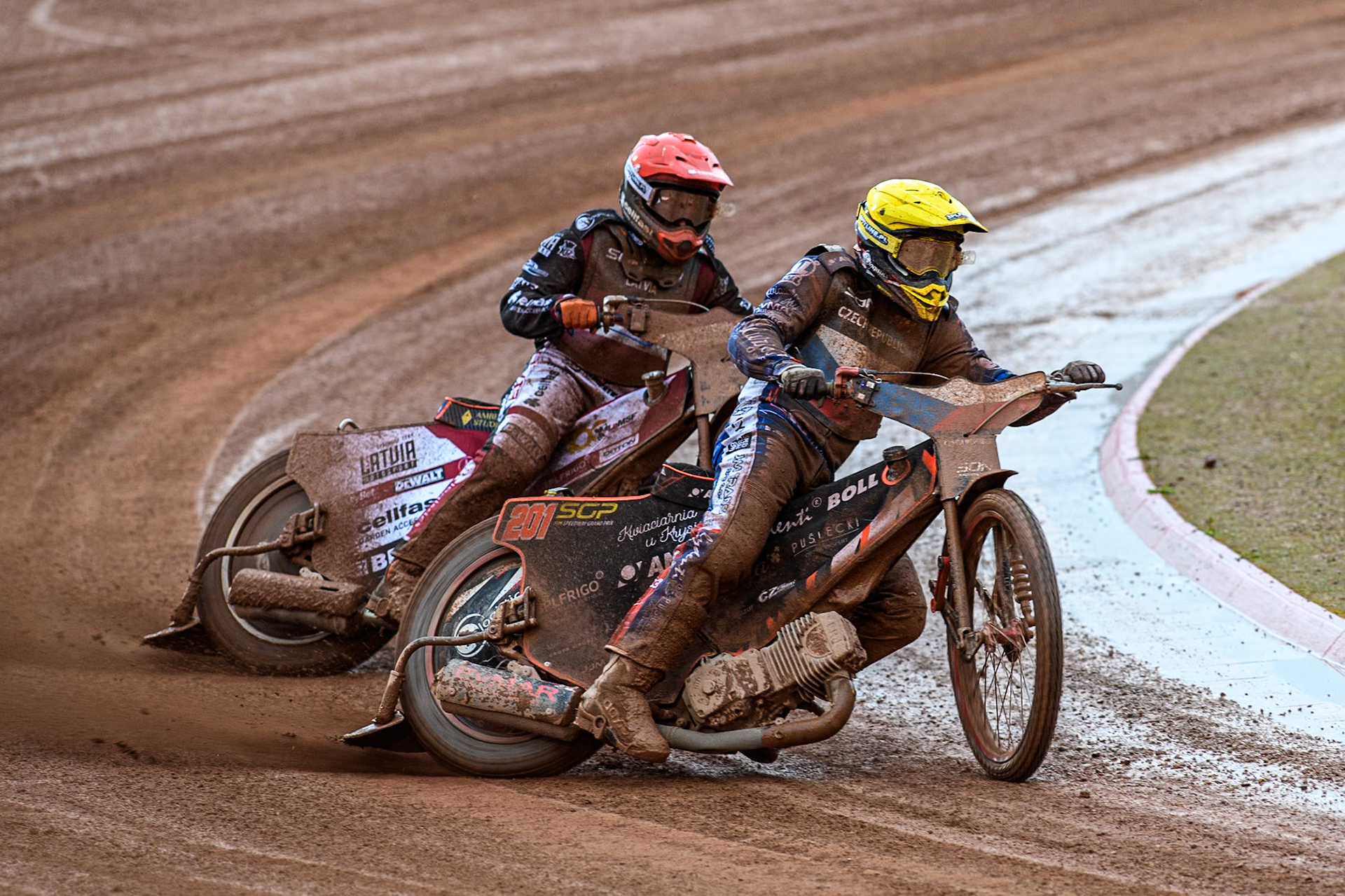 Jan Kvech of The Czech Republic in Yellow leading Andzejs Lebedevs of Latvia in Red during the Monster Energy FIM Speedway of Nation Semi Final 2 at the National Speedway Stadium, Manchester on Wednesday 10th July 2024. (Photo: Ian Charles | MI News)