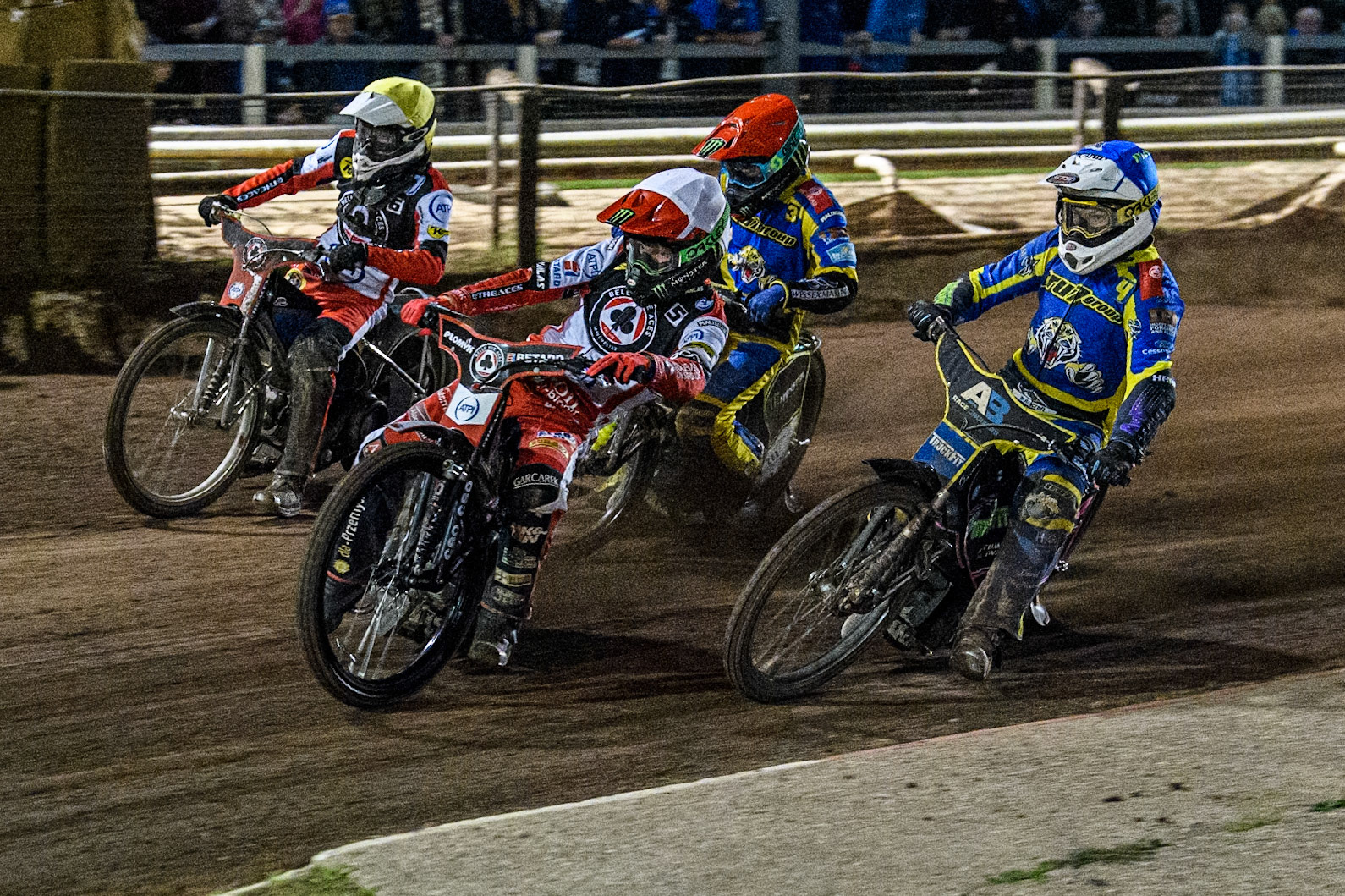 Belle Vue Aces' Dan Bewley  in White and Belle Vue Aces' Antti Vuolas  in Yellow leading Sheffield Tigers' Josh Pickering  in Blue and Sheffield Tigers' Chris Holder during the Rowe Motor Oil Premiership Play Off Semi Final 2nd leg between Sheffield Tigers and Belle Vue Aces at Owlerton Stadium, Sheffield on Thursday 19th September 2024. (Photo: Ian Charles | MI News)