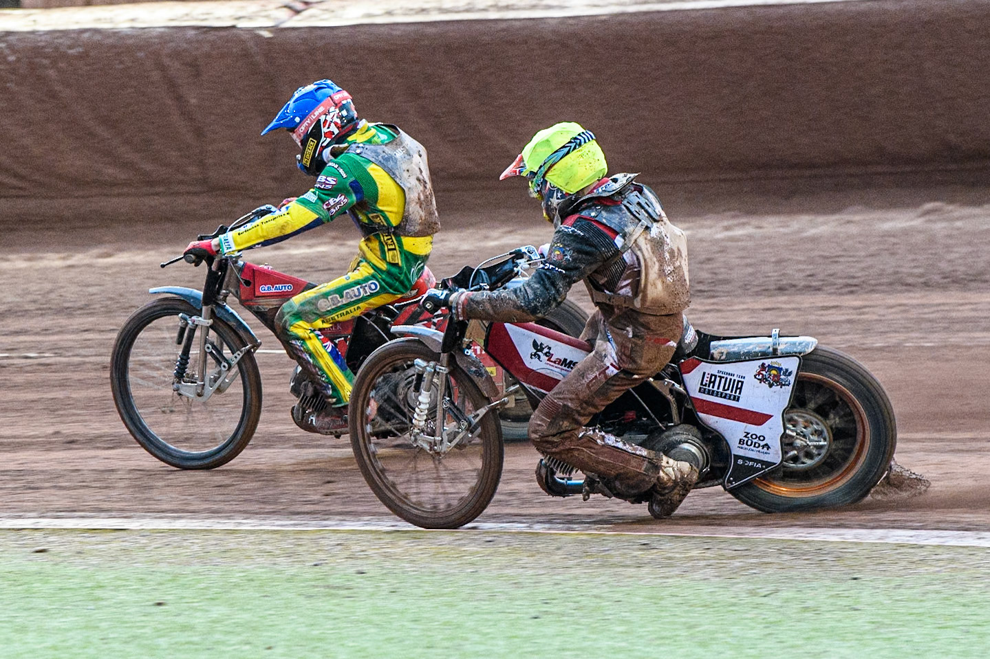 Max Fricke of Australia in Blue leading Daniils Kolodinskis of Latvia in Yellow during the Monster Energy FIM Speedway of Nation Semi Final 2 at the National Speedway Stadium, Manchester on Wednesday 10th July 2024. (Photo: Ian Charles | MI News)