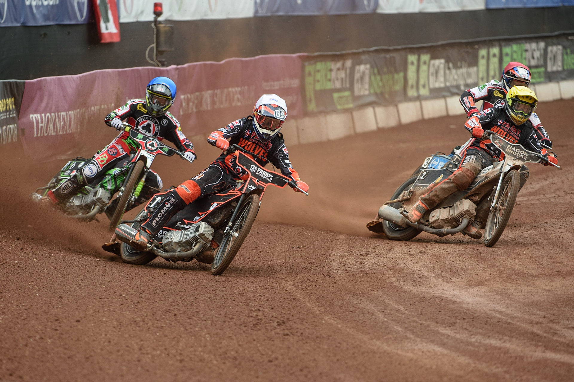 MANCHESTER, UK. AUGUST 30TH Sam Masters  (White) and Broc Nicol (Yellow) lead Charles Wright  (Blue) and Steve Worrall  (Red)’ during the SGB Premiership match between Belle Vue Aces and Wolverhampton Wolves at the National Speedway Stadium, Manchester on Monday 30th August 2021. (Credit: Ian Charles | MI News)