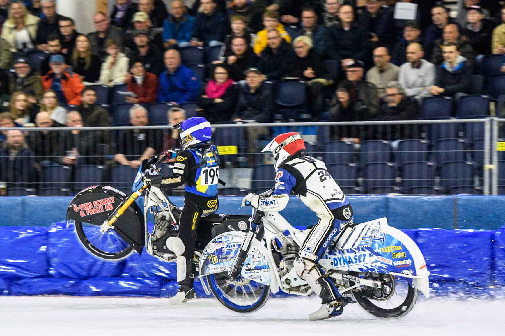 Martin Haarahiltunen (199) of Sweden in Blue picks up some drive leading Max Koivula (24) of Finland in Blue during the FIM Ice Speedway Gladiators World Championship, Final 3 at the Ice Stadium, Thialf, Heerenveen on Saturday 5th April 2025. (Photo: Ian Charles | MI News)