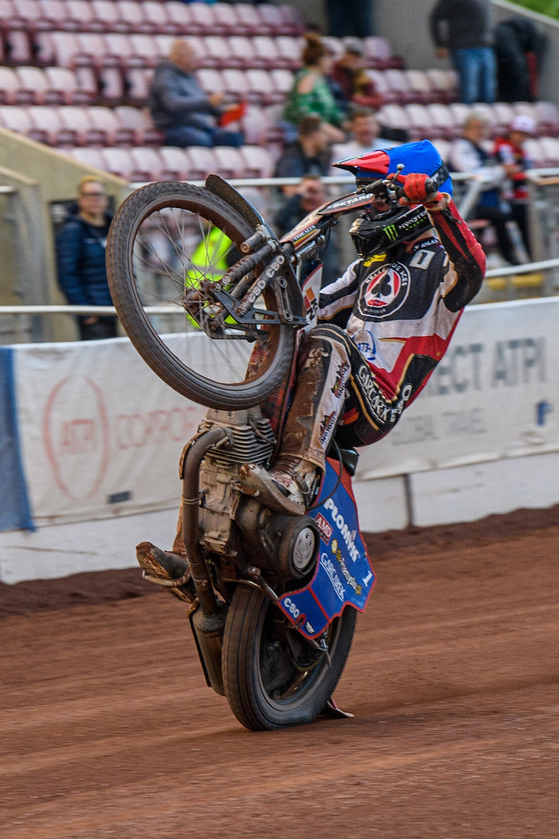 Dan Bewley celebrates with a wheelie during the Sports Insure Premiership match between Belle Vue Aces and Wolverhampton Wolves at the National Speedway Stadium, Manchester on Monday 3rd July 2023. (Photo: Ian Charles | MI News)