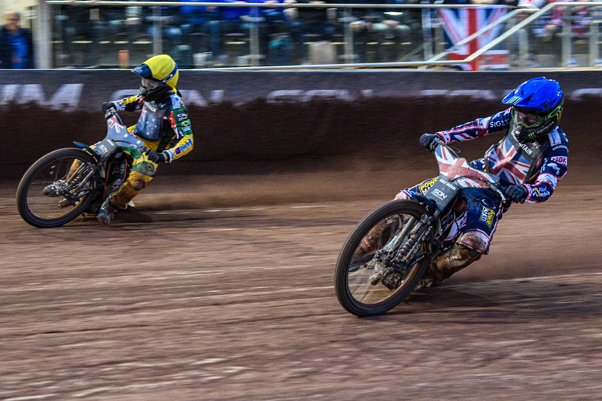 Dan Bewley of Great Britain in Blue rides inside Brady Kurtz of Australia in Yellow during the Monster Energy FIM Speedway of Nation Final at the National Speedway Stadium, Manchester on Saturday 13th July 2024. (Photo: Ian Charles | MI News)