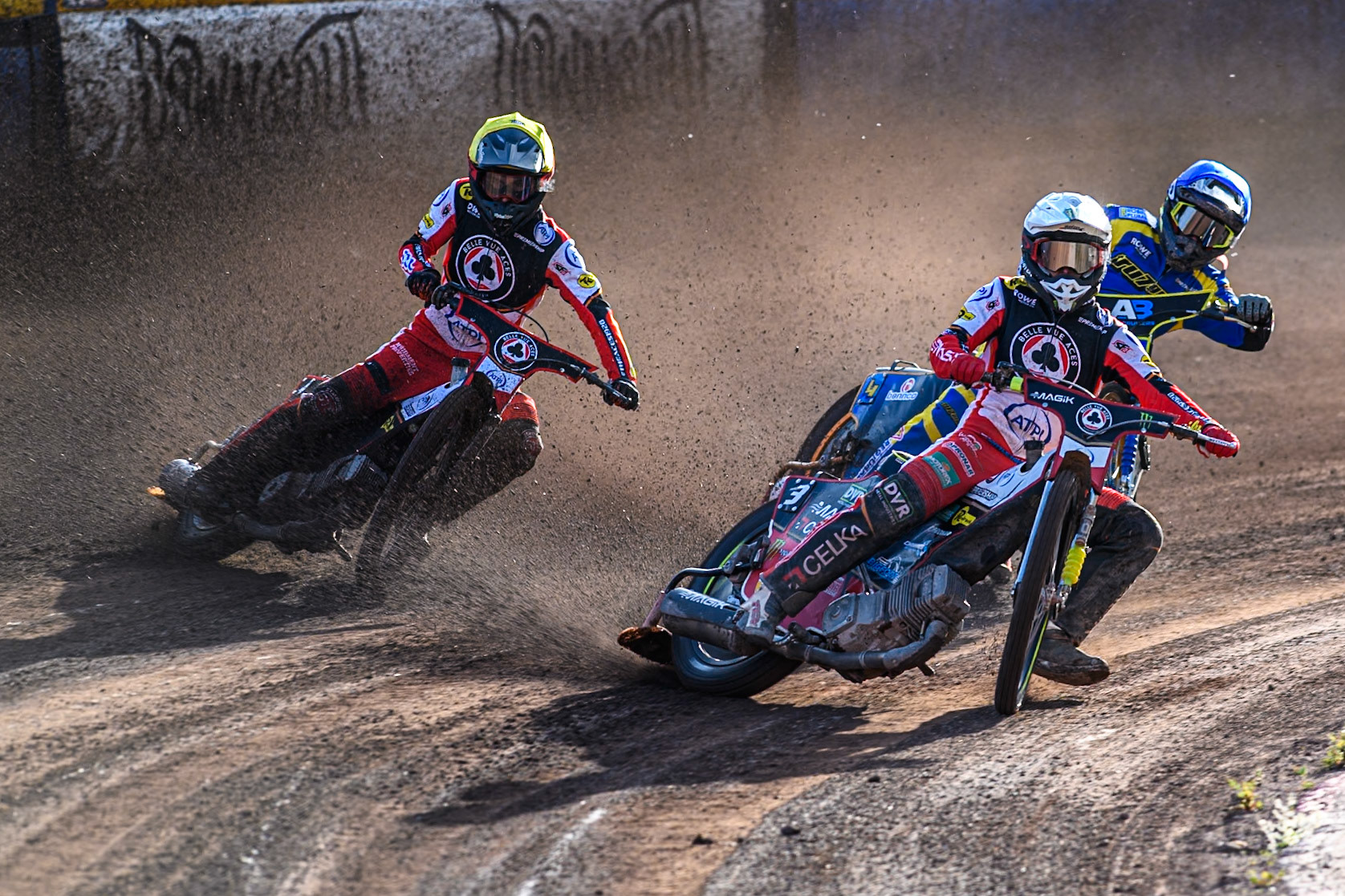 Jaimon Lidsey of Belle Vue Aces in White leading Justin Sedgmen of Sheffield Tigers in Blue and Zach Cook of Belle Vue Aces in Yellow during the Rowe Motor Oil Premiership match between Sheffield Tigers and Belle Vue Aces at Owlerton Stadium, Sheffield on Monday 5th May 2025. (Photo: Ian Charles | MI News)