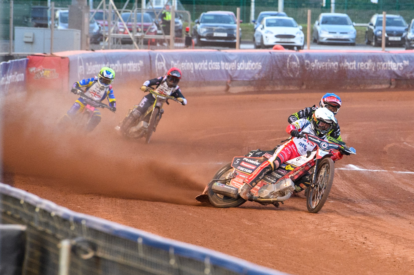 Dan Bewley in White leading Drew Kemp in Blue Leon Flint in Yellow and Vinnie Foord in Red during the Attis Insurance Sports Division British Final at the National Speedway Stadium, Manchester on Monday 12th May 2025. (Photo: Ian Charles | MI News)