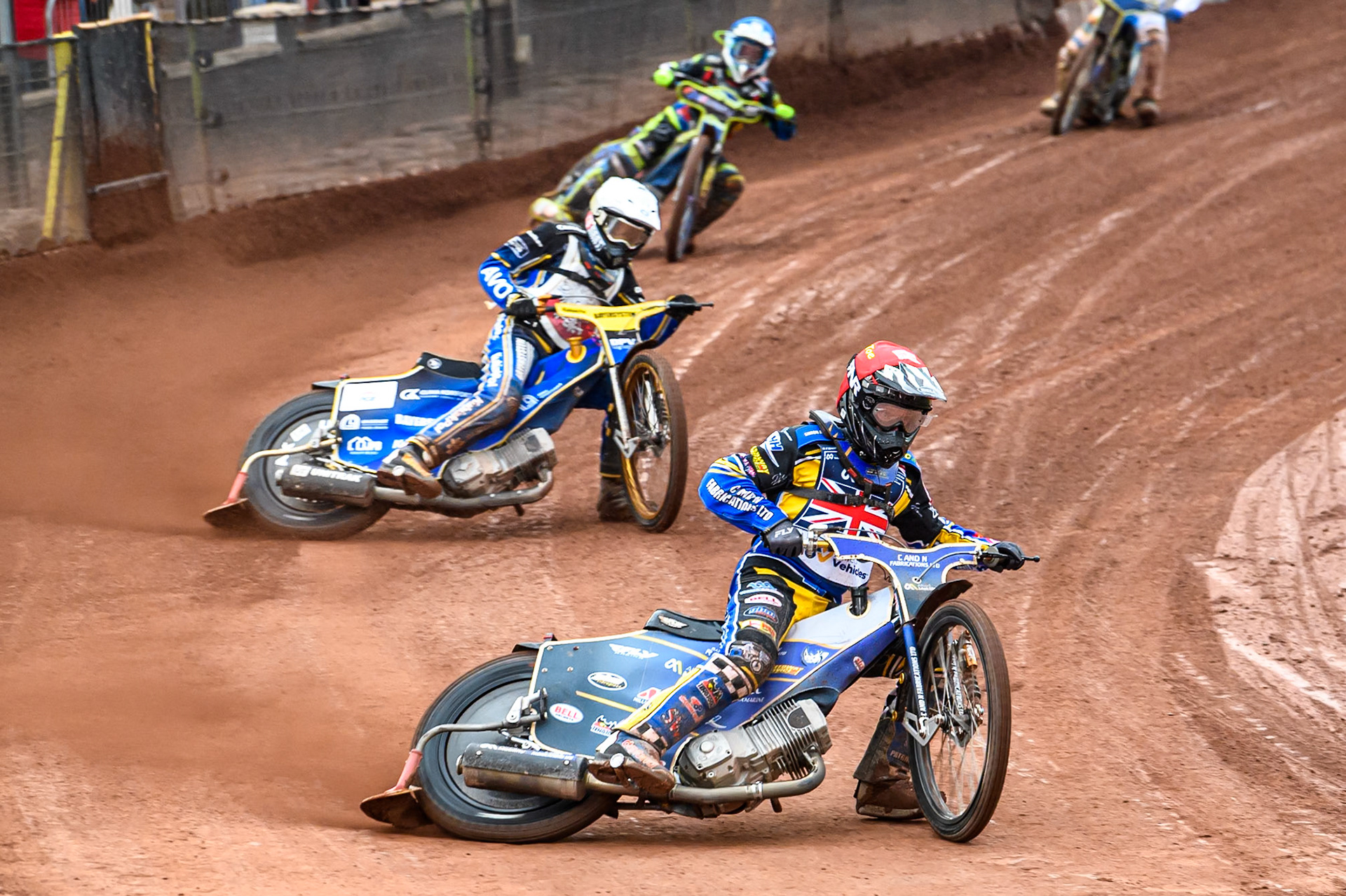 Joe Thompson of Great Britain in Red leading Jan Przanowski of Poland in White and Patricia Erhart of Germany in Blue during the FIM SGP2 Qualifying Round at the Peugeot Ashfield Stadium in Glasgow on Saturday 24th May 2025. (Photo: Ian Charles | MI News)