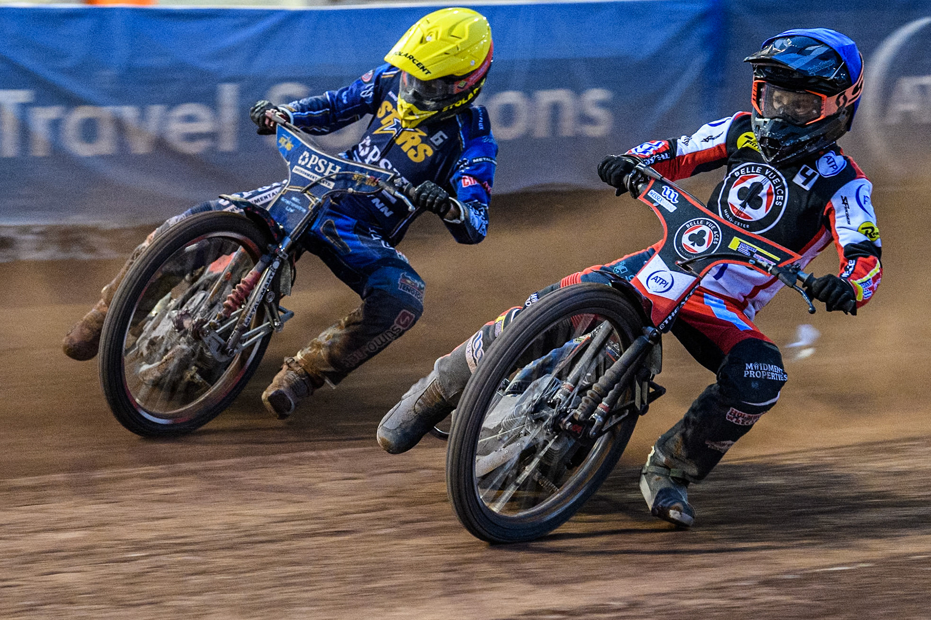 Belle Vue Aces' Ben Cook in Blue rides inside King Lynn Stars' Patryk Wojdylo in Yellow during the Rowe Motor Oil Premiership match between Belle Vue Aces and King's Lynn Stars at the National Speedway Stadium, Manchester on Monday 20th May 2024. (Photo: Ian Charles | MI News)