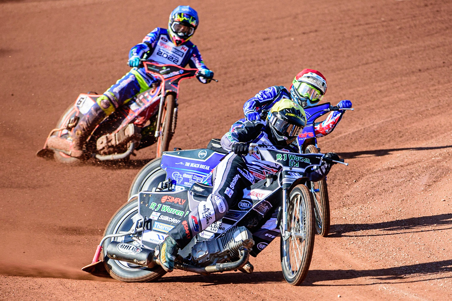 Danny King (Yellow) leads Adam Ellis  (Red) and Scott Nicholls  (Blue) leads  during the Sports Insure British Speedway Final, at the National Speedway Stadium, Manchester, on Sunday 18th September 2022. (Credit: Ian Charles | MI News )
