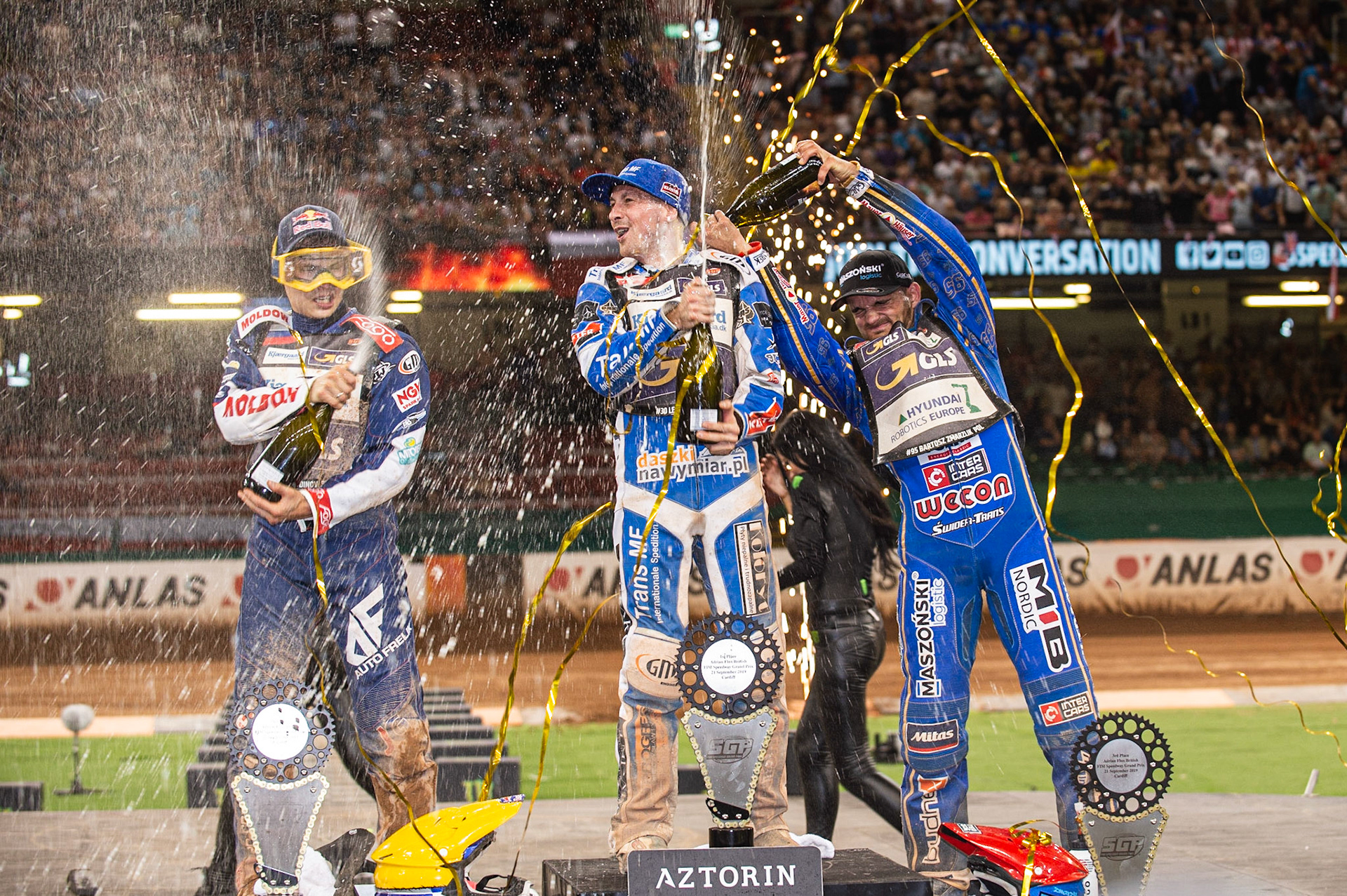 CARDIFF,WALES  Champagne capers on the rostrum during the ADRIAN FLUX BRITISH FIM SPEEDWAY GRAND PRIX at the Principality Stadium, Cardiff on Saturday 21st September 2019. (Credit: Ian Charles | MI News)