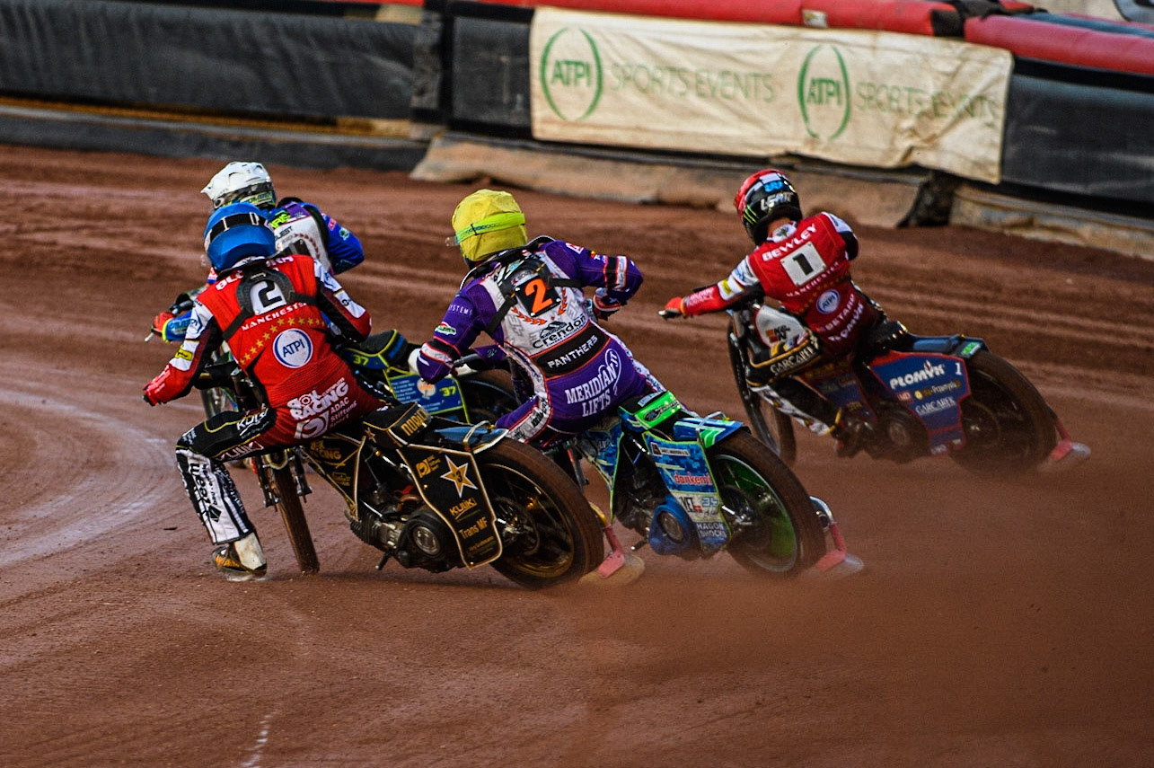Norick Blodorn  (Blue) chases Hans Andersen  (Yellow) Chris Harris   (White) and Dan Bewley  (Red) during the SGB Premiership match between Belle Vue Aces and Peterborough at the National Speedway Stadium, Manchester on Monday 24th April 2023. (Photo: Ian Charles | MI News)