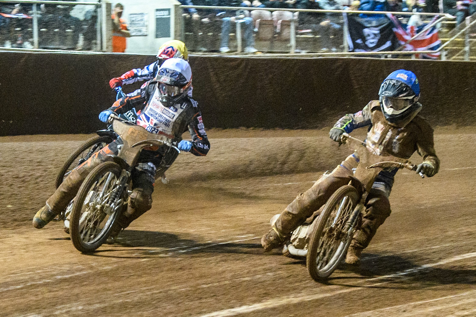 Steve Worrall (White) outside Joe Thompson (Blue) with Track reserve Freddy Hodder (Yellow) behind during the Sports Insure British Speedway Final at the National Speedway Stadium, Manchester on Monday 14th August 2023. (Photo: Ian Charles | MI News)