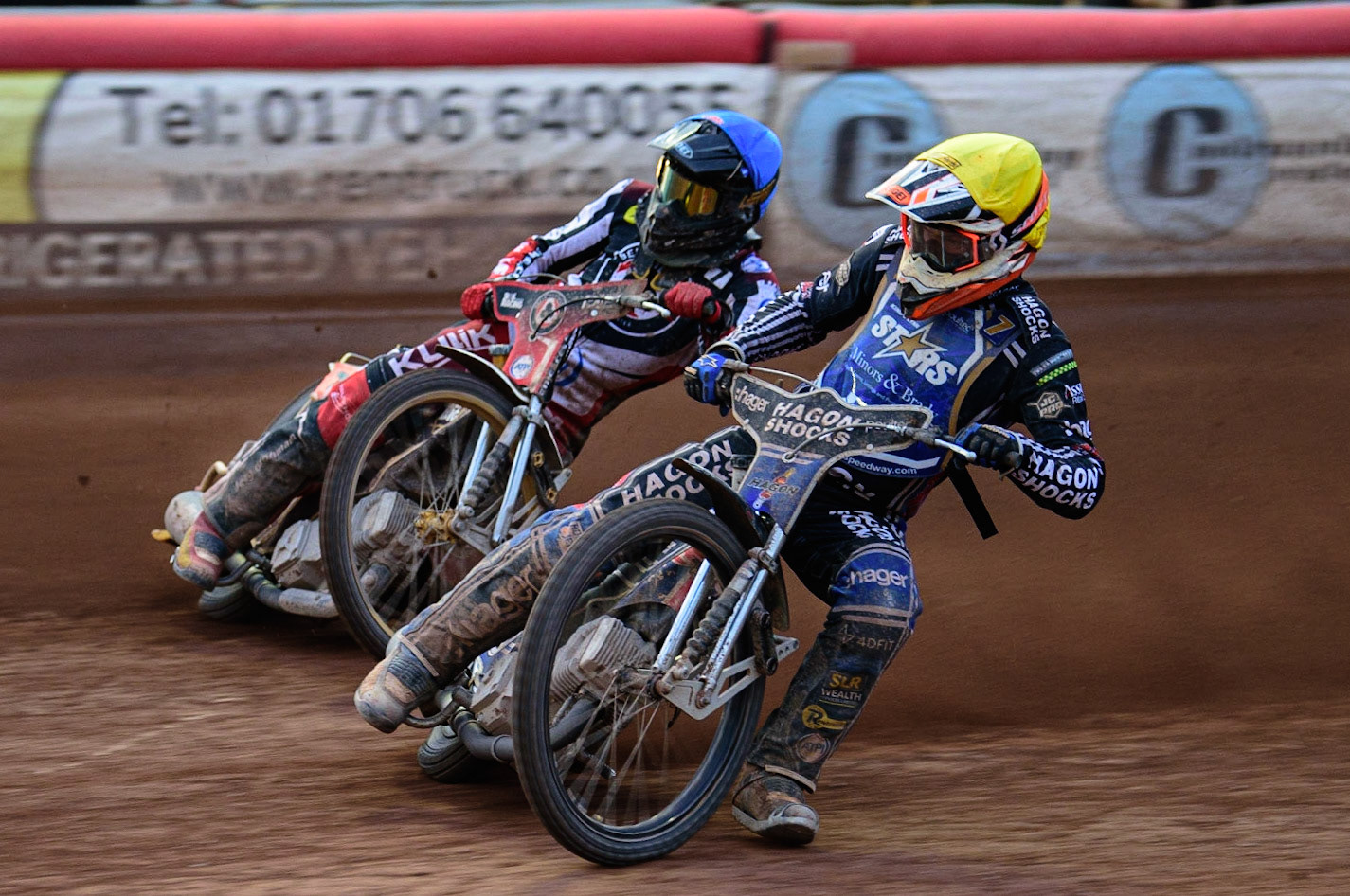 MANCHESTER UK  Jason Edwards  (Yellow) inside Norick Blodorn  (Blue) during the SGB Premiership match between Belle Vue Aces and King's Lynn Stars at the National Speedway Stadium, Manchester on Monday 11th July 2022. (Credit: Ian Charles | MI News)