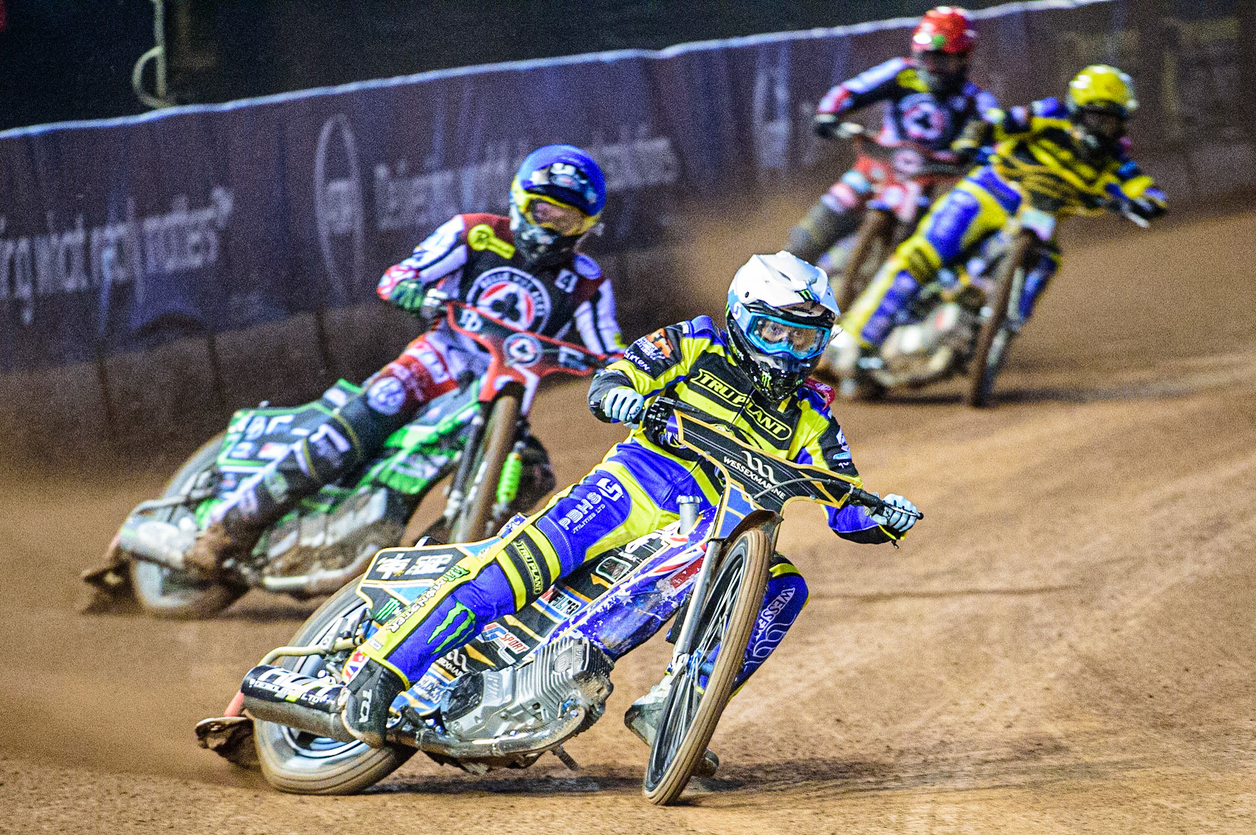 Jack Holder  (White) leads Charles Wright  (Blue) ahead of Kyle Howarth  (Yellow) and Jaimon Lidsey  (Red) during the SGB Premiership match between Belle Vue Aces and Sheffield Tigers at the National Speedway Stadium, Manchester on Monday 27th March 2023. (Photo: Ian Charles | MI News)