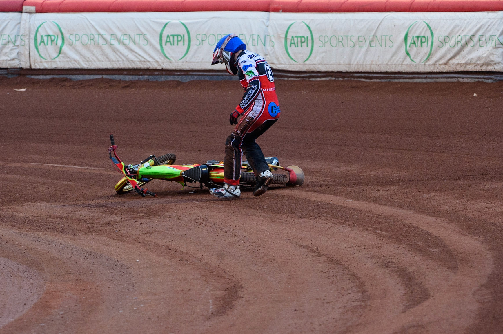 MANCHESTER, UK. MAY 28TH  After parting company with his machine, Ben Woodhull runs to move his bike to avoid a race stoppage during the SGB National Development League match between Belle Vue Colts and Berwick Bullets at the National Speedway Stadium, Manchester on Friday 28th May 2021. (Credit: Ian Charles | MI News)