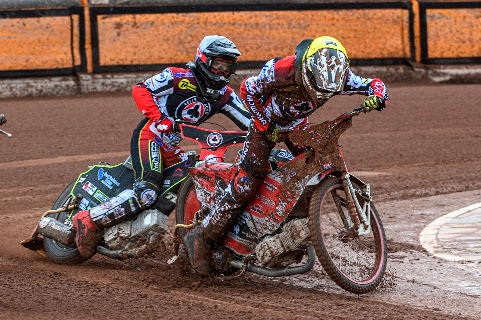 Connor Bailey (Yellow) locks up and falls ahead of team mate Tom Brennan (White) during the Sports Insure Premiership match between Wolverhampton Wolves and Belle Vue Aces at Monmore Green Stadium, Wolverhampton on Monday 10th July 2023. (Photo: Ian Charles | MI News)
