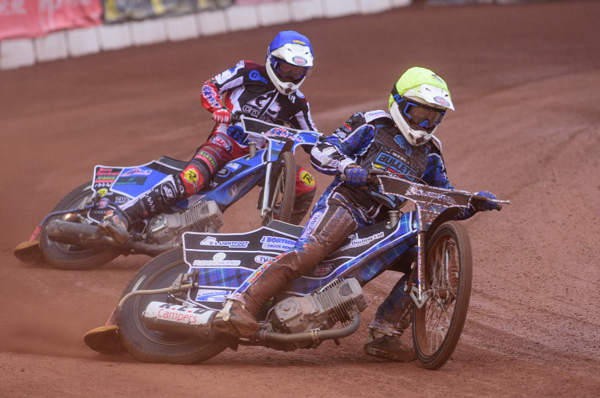 MANCHESTER, UK. JUN 24TH  Greg Blair  (Yellow) leads Archie Freeman (Blue) during the National Development League match between Belle Vue Colts and Berwick Bullets at the National Speedway Stadium, Manchester on Friday 24th June 2022. (Credit: Ian Charles | MI News)