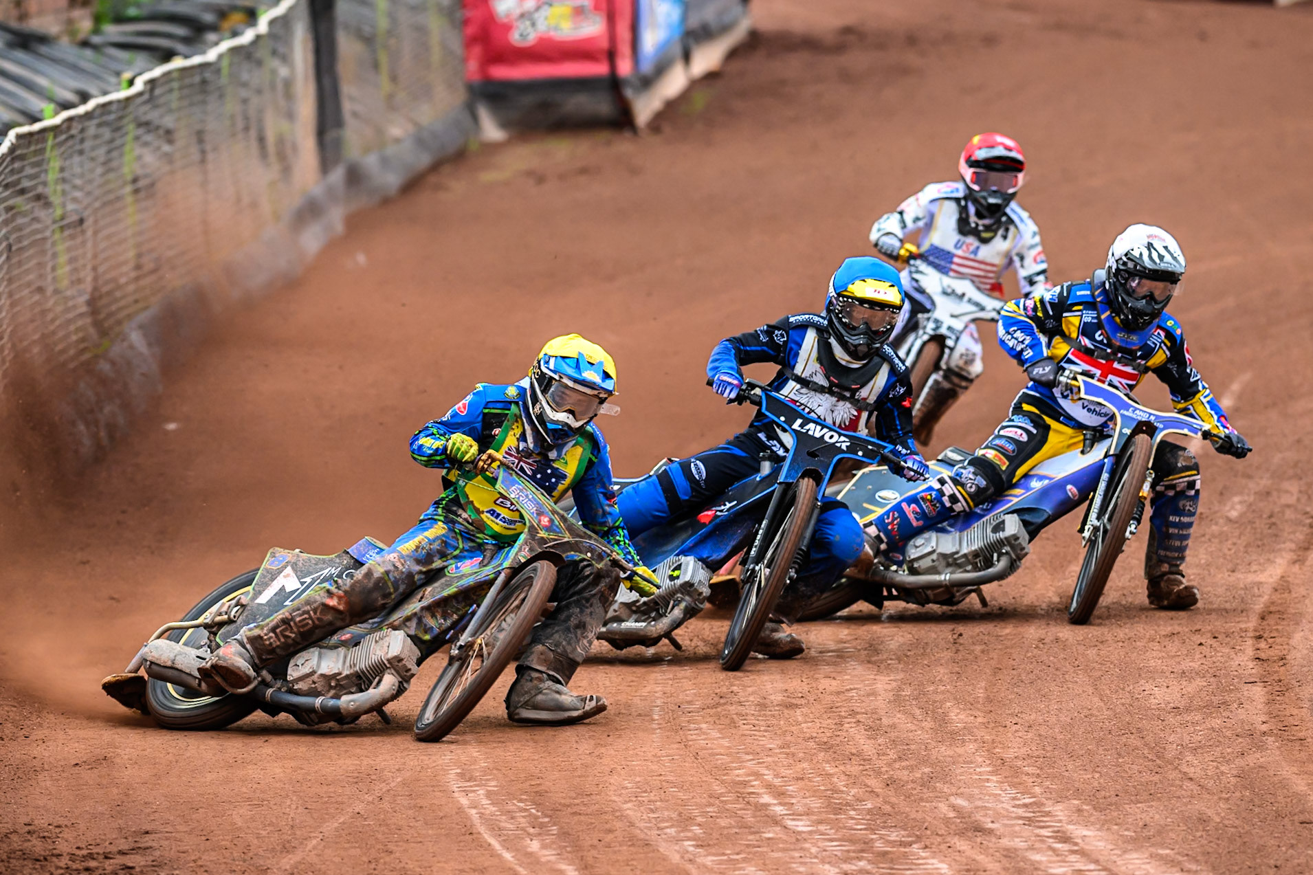 Michael West of Australia in Yellow leading Antoni Mencel of Poland in Blue, Joe Thompson of Great Britain in White and Slater Lightcap of The United States in Red during the FIM SGP2 Qualifying Round at the Peugeot Ashfield Stadium in Glasgow on Saturday 24th May 2025. (Photo: Ian Charles | MI News)