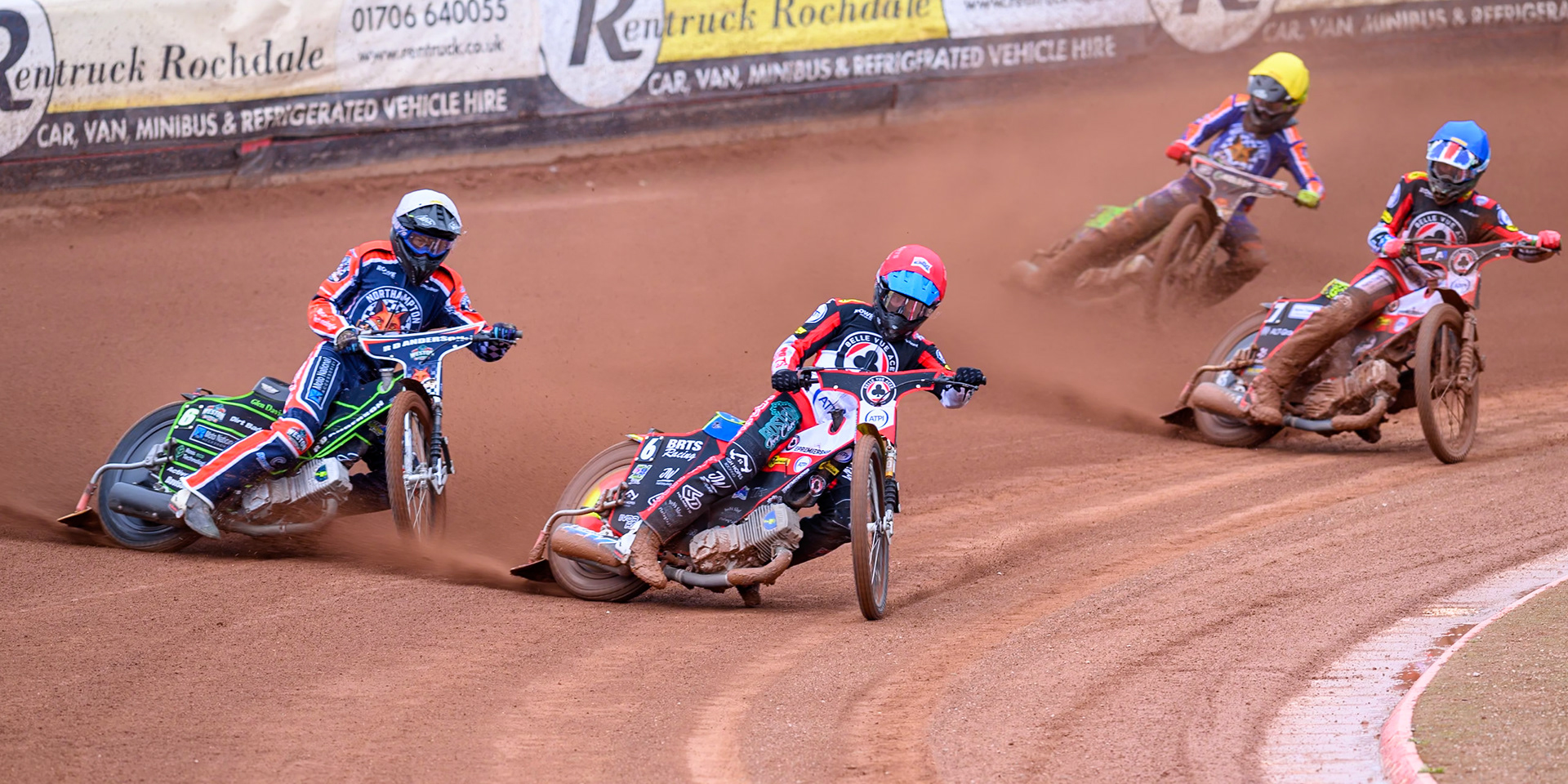 Tate Zischke of Belle Vue Aces in Red leading Kye Thomson of Northampton Foxes in White Will Cairns of Belle Vue Aces in Blue and Luke Harrison of Northampton Foxes in Yellow during the Rowe Motor Oil Premiership match between Belle Vue Aces and Northampton Foxes at the National Speedway Stadium, Manchester on Monday 4th May 2026. (Photo: Ian Charles | MI News)