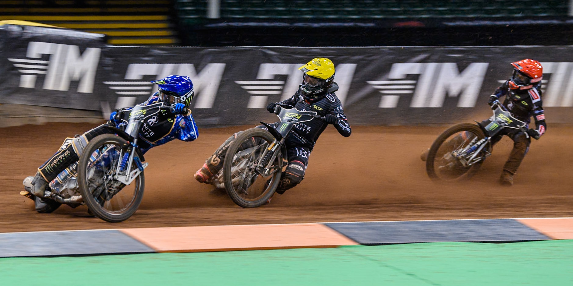 Jack Holder (25) of Australia in Blue leading Kai Huckenbeck (744) of Germany in Yellow and Leon Madsen (30) of Denmark in Red during the FIM Speedway Grand Prix of Great Britain at The Principality Stadium, Cardiff on Saturday 17th August 2024. (Photo: Ian Charles | MI News)