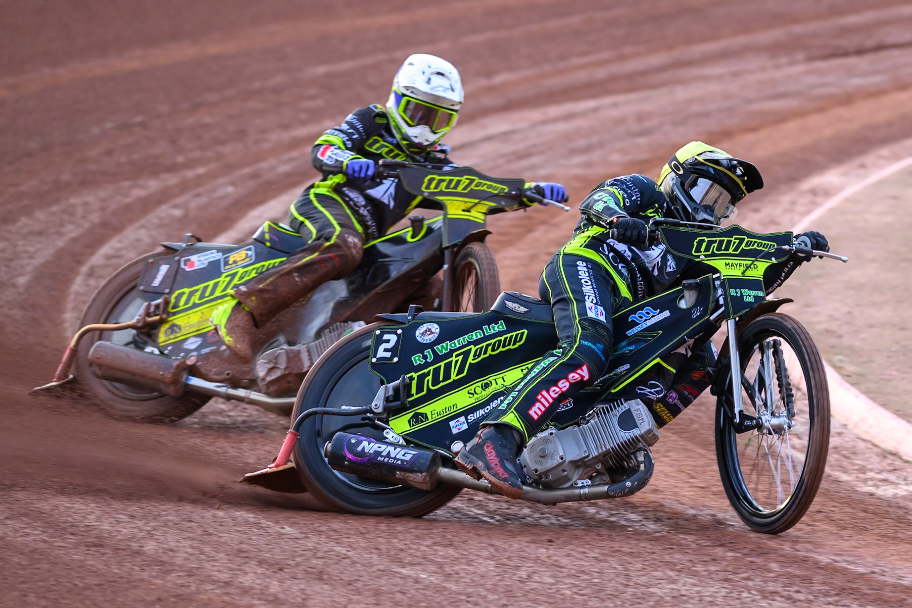 Danny King of Ipswich Witches in Yellow leading Tom Brennan of Ipswich Witches  in White during the Rowe Motor Oil Premiership match between Belle Vue Aces and Ipswich Witches at the National Speedway Stadium, Manchester on Monday 20th April 2026. (Photo: Ian Charles | MI News)