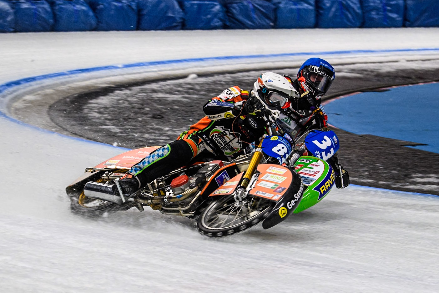 Germany's Johann Weber (33) (Blue) inside Germany's Markus Jell (82) (White) during the FIM Ice Speedway Gladiators World Championship Final 1 at the Max-Aicher-Arena, Inzell on Saturday 23 March 2024. (Photo: Ian Charles | MI News)
