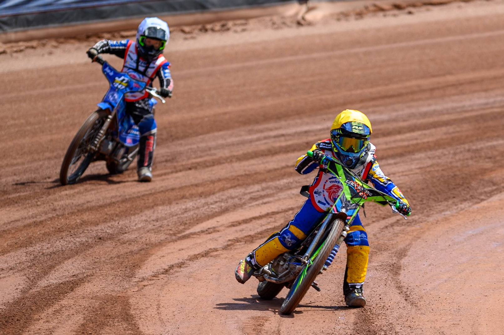 125cc SUPPORT CLASS Ezra McNair (343) in Yellow leading Junior Travers (247) in White during the British Youth Championship (125cc) at the National Speedway Stadium, Manchester on Sunday 19th July 2026. (Photo: Ian Charles | MI News)