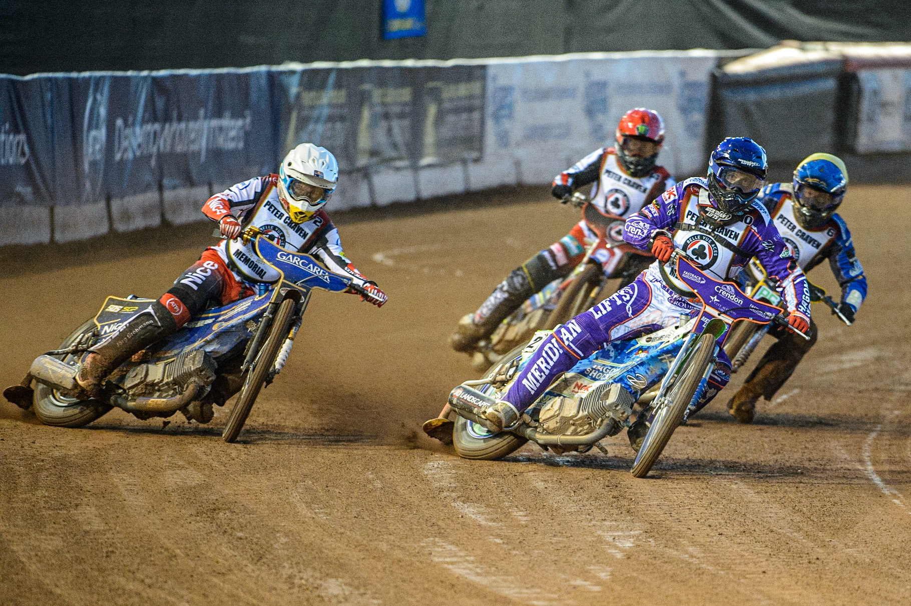Hans Andersen  (Blue) leads Robert Lambert  (White), Kyle Howarth  (Yellow) and Jaimon Lidsey  (Red) during the Peter Craven Memorial Trophy  at the National Speedway Stadium, Manchester on Monday 3rd April 2023. (Photo: Ian Charles | MI News)